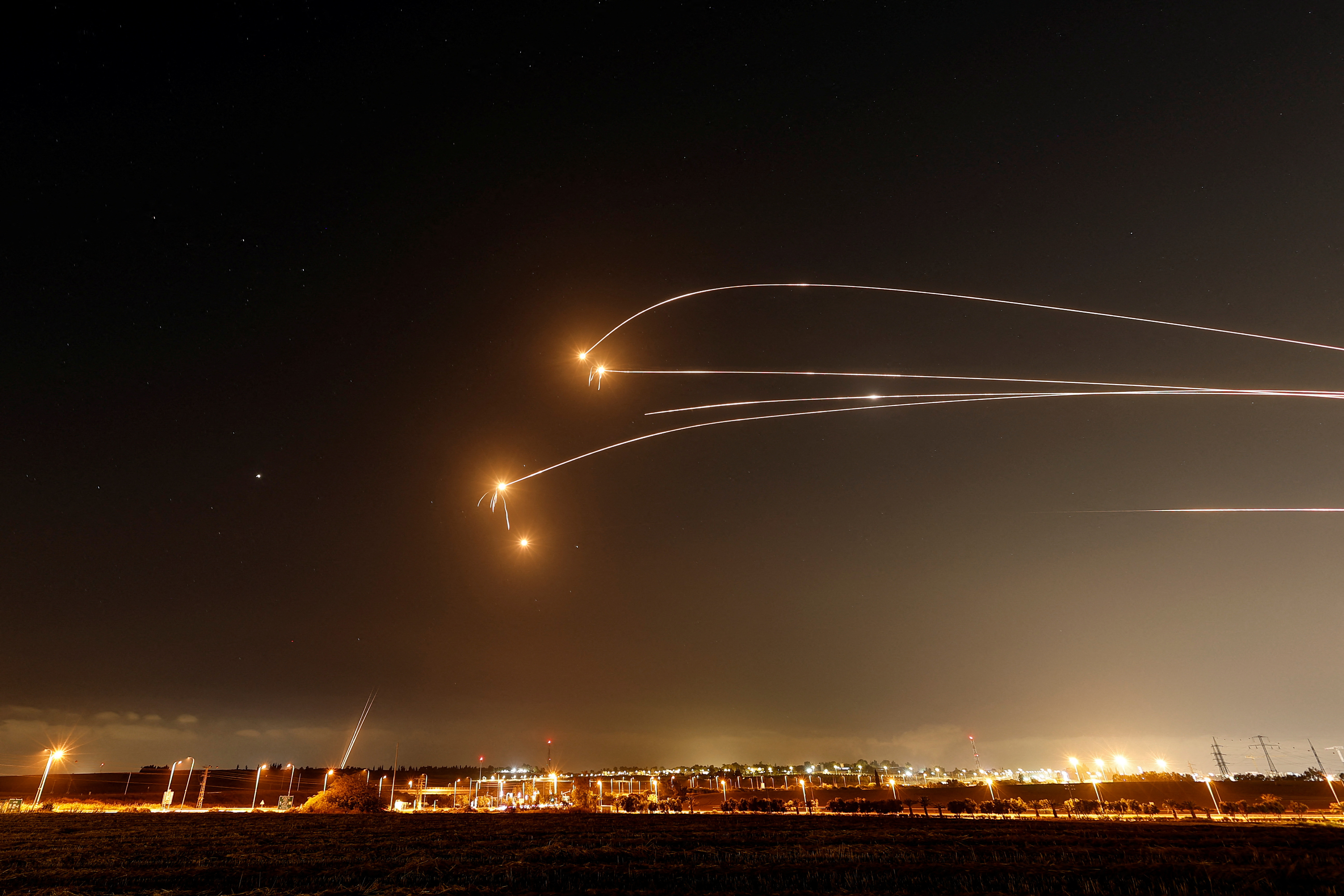 Israel's Iron Dome anti-missile system intercepts rockets launched from the Gaza Strip, as seen from Sderot, Israel May 13, 2023 REUTERS/Ammar Awad