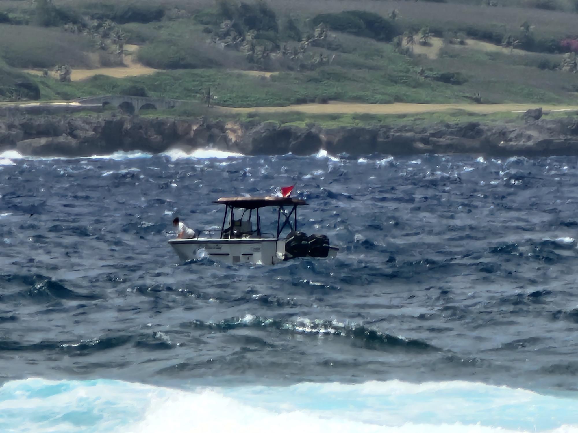 A BECQ boat continues the search on Monday for 15-year-old Bradley Delos Santos who was swept by a big wave into open water on Saturday afternoon at Marine Beach.