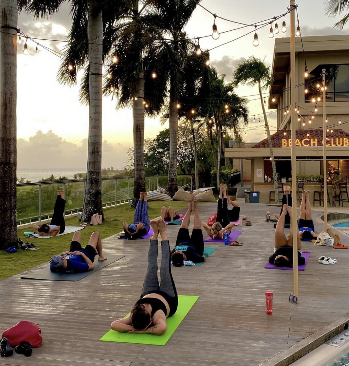 Molena Macduff teaches a Pilates class at Coral Ocean Point at sunset.