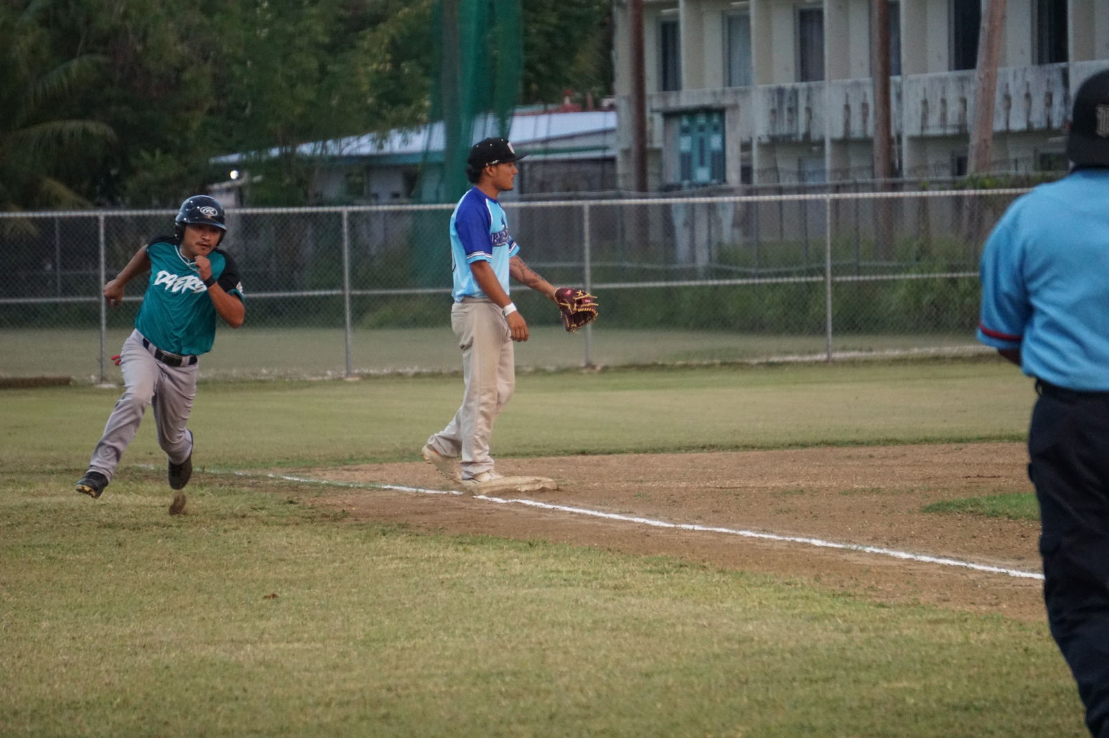 D9er's Tindin Leon Guerrero takes advantage of an error and rushes home during a Tan Holdings Saipan Baseball League game Thursday at the Francisco "Tan Ko" Palacios Baseball Field.