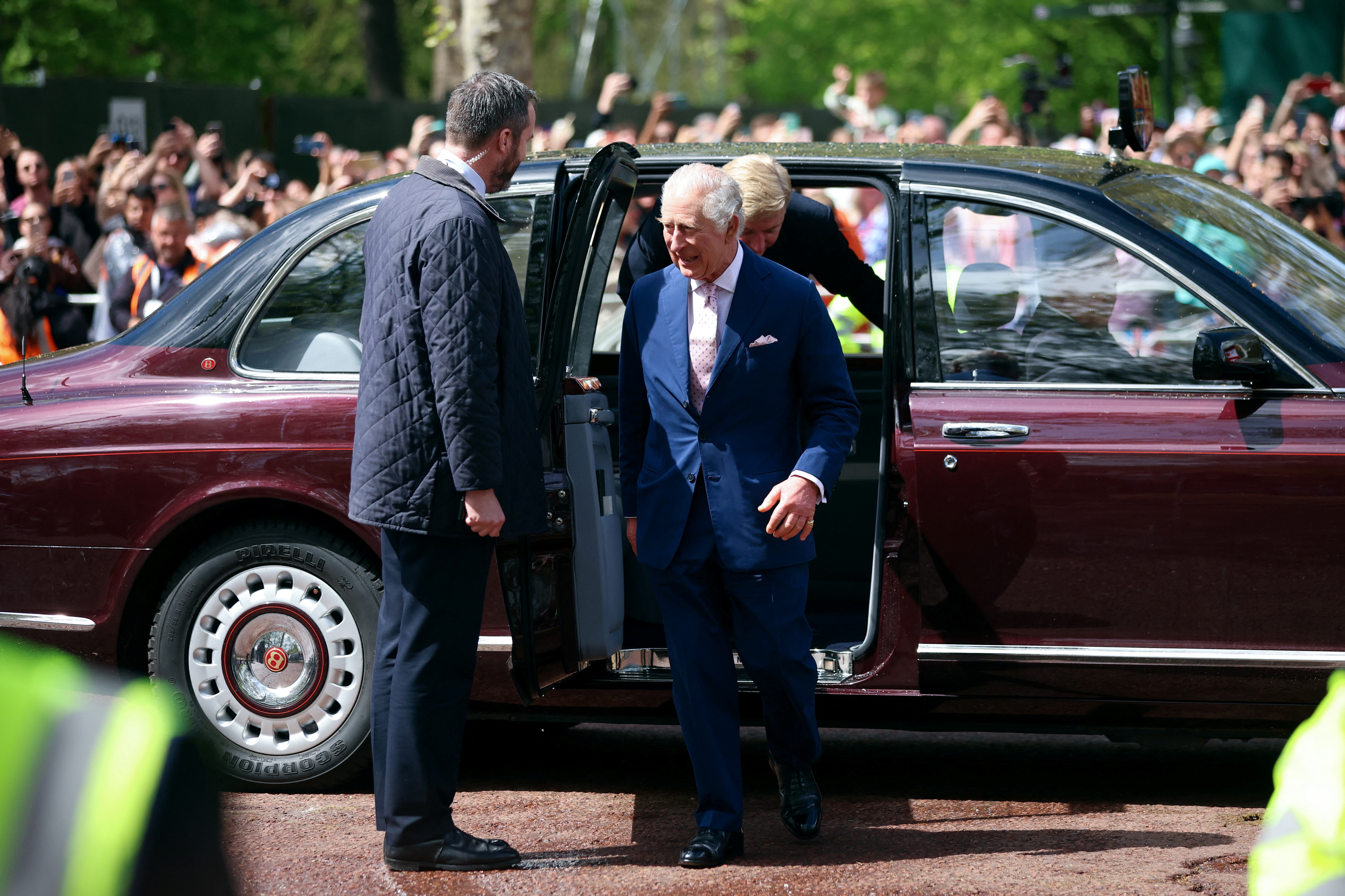 Britain's King Charles exits a vehicle to meet well-wishers during a walkabout on the Mall outside Buckingham Palace ahead of his and Camilla, Queen Consort's coronation, in London, Britain, May 5, 2023. REUTERS/Phil Noble