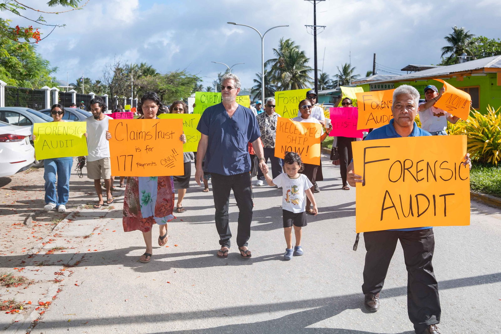 Bikini islanders marched along Majuro's single main road Thursday to the capital building, demanding that the national government place the Bikini local government into receivership and launch investigations into spending that has exhausted a trust fund that as recently as 2017 held $71 million.