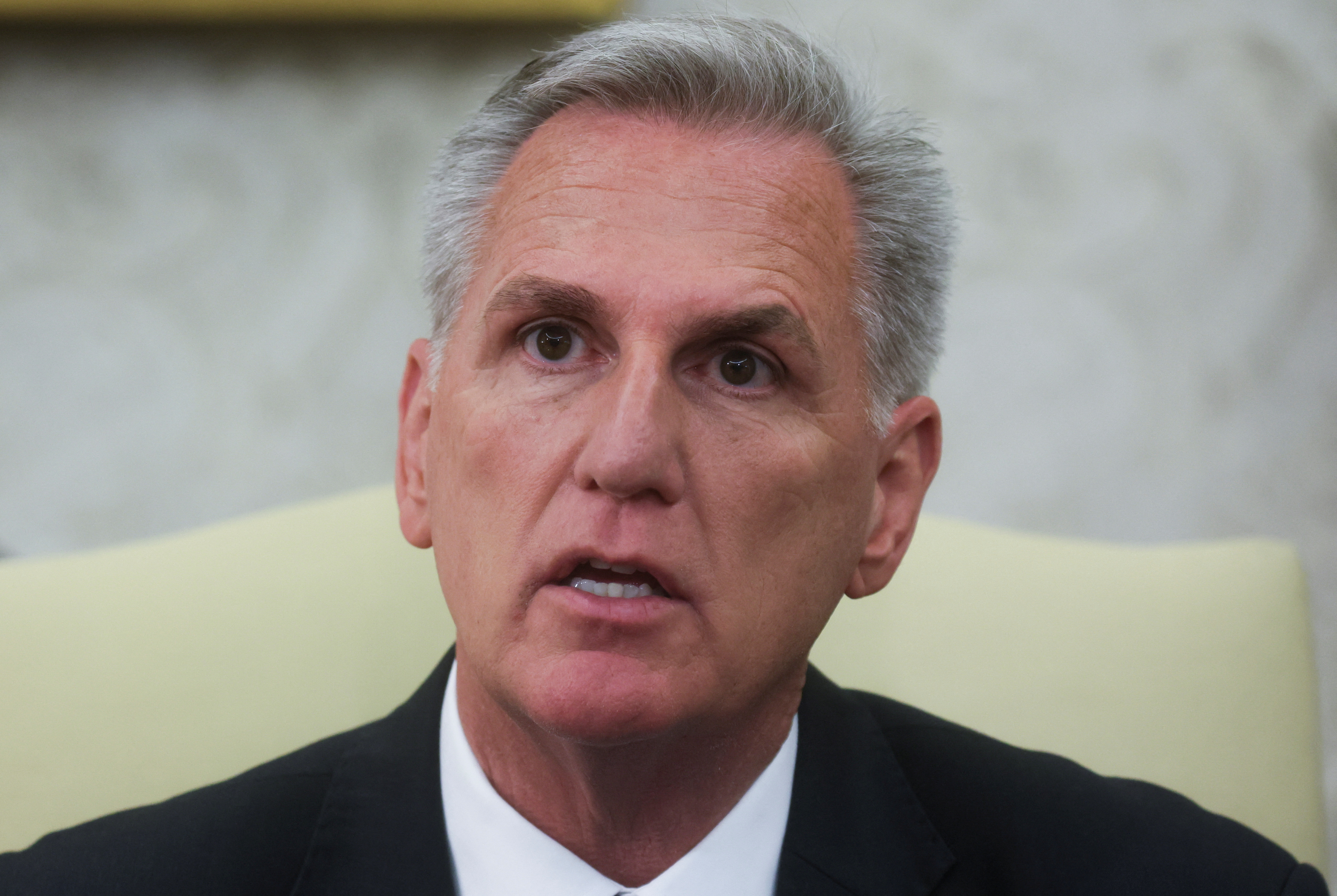 House Speaker Kevin McCarthy (R-CA) talks to reporters as he sits with U.S. President Joe Biden for debt limit talks in the Oval Office at the White House in Washington, U.S., May 22, 2023. REUTERS/Leah Millis