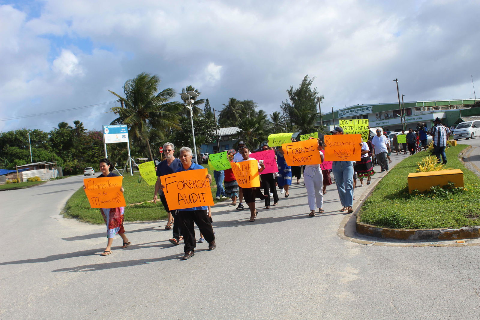 Bikini islanders marched along Majuro's single main road Thursday to the capital building, demanding that the national government place the Bikini local government into receivership and launch investigations into spending that has exhausted a trust fund that as recently as 2017 held $71 million.