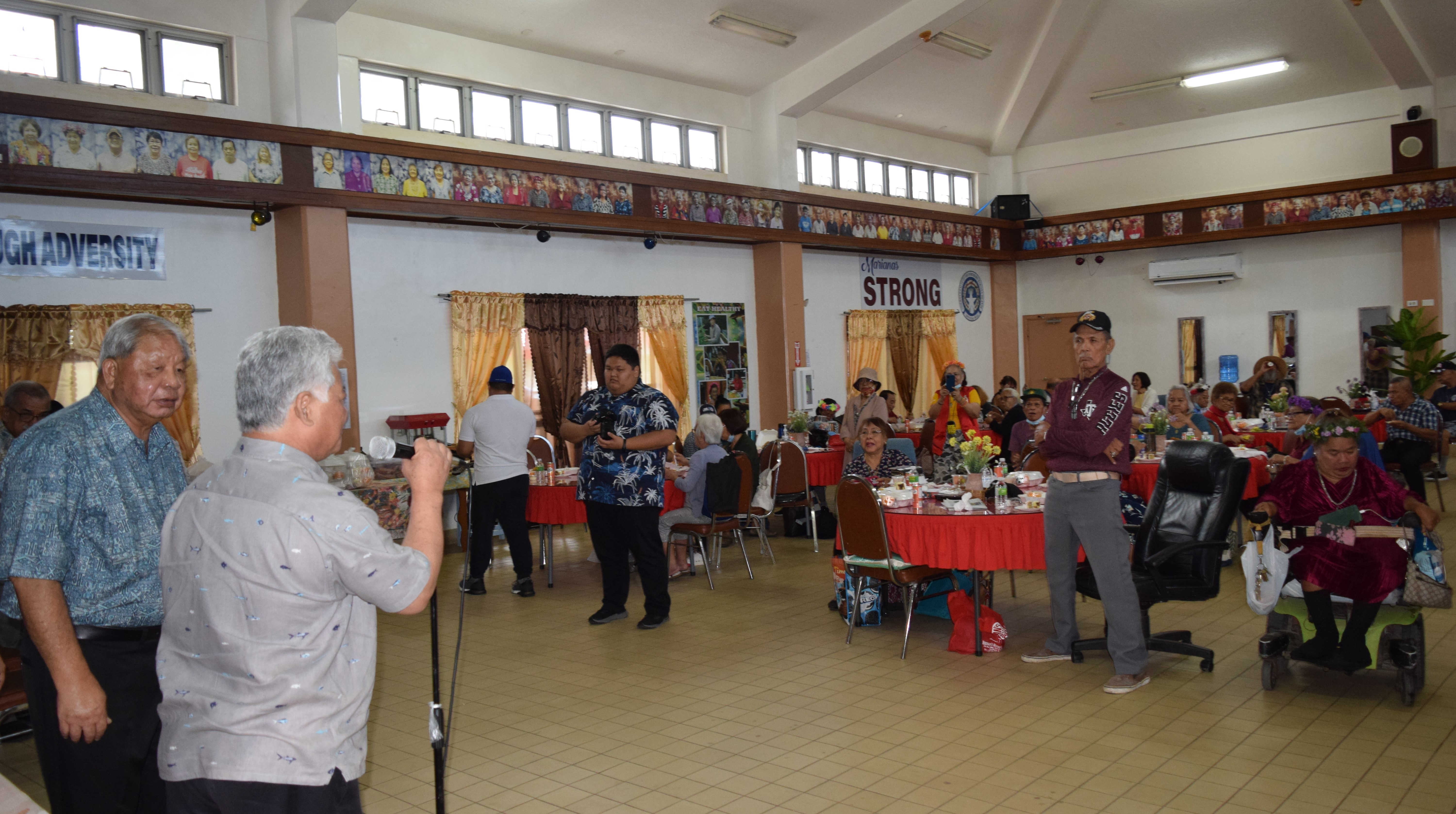 Gov. Arnold I. Palacios greets the manamko’ as Lt. Gov. David M. Apatang looks on during the Mother's Day celebration at the Office on Aging on Thursday.