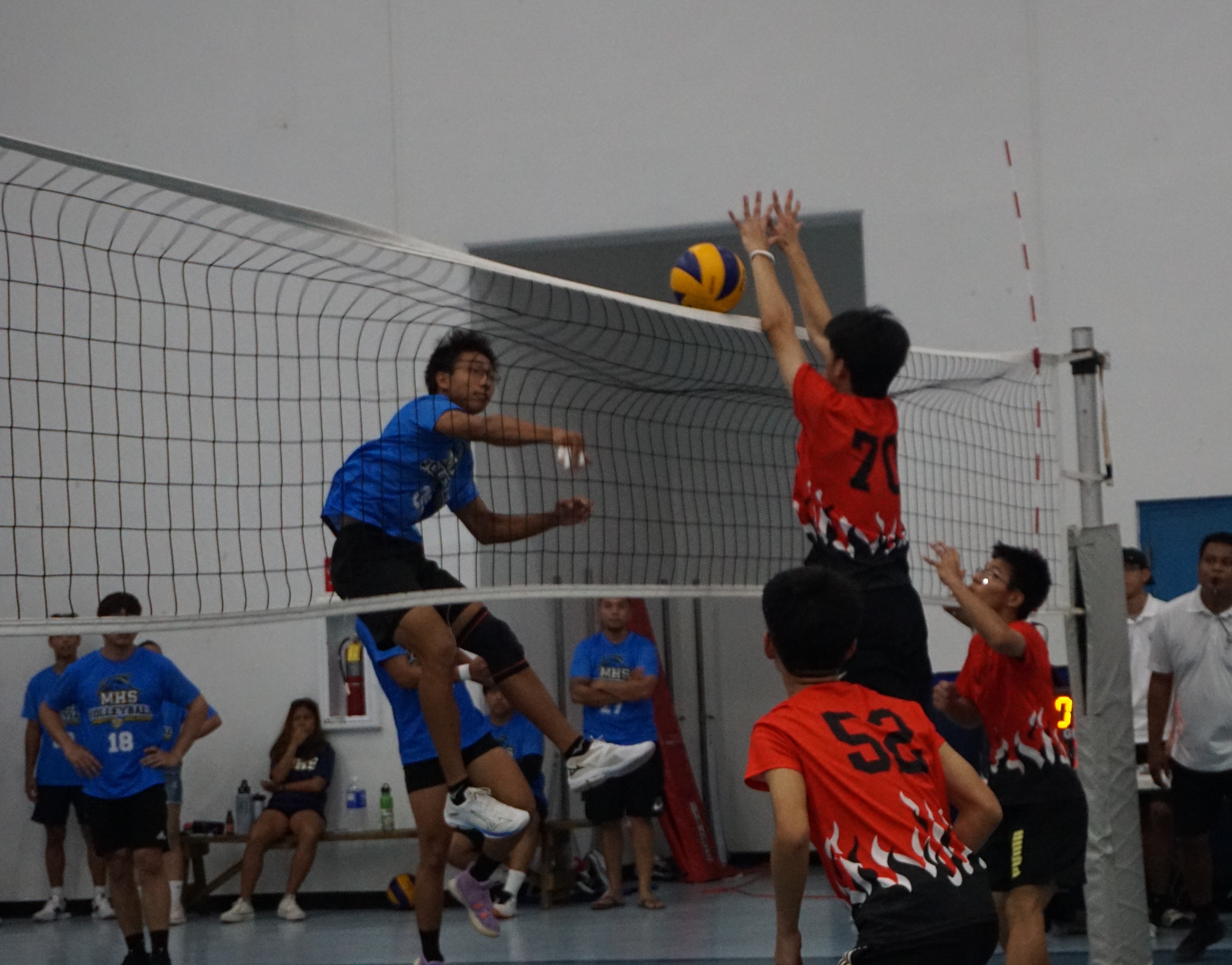 Marianas High School’s Arriola connects the spike against Agape Christian School in the boys high school division championship of the PSS-NMIVA Interscholastic Volleyball League at the MHS gym on Saturday. 