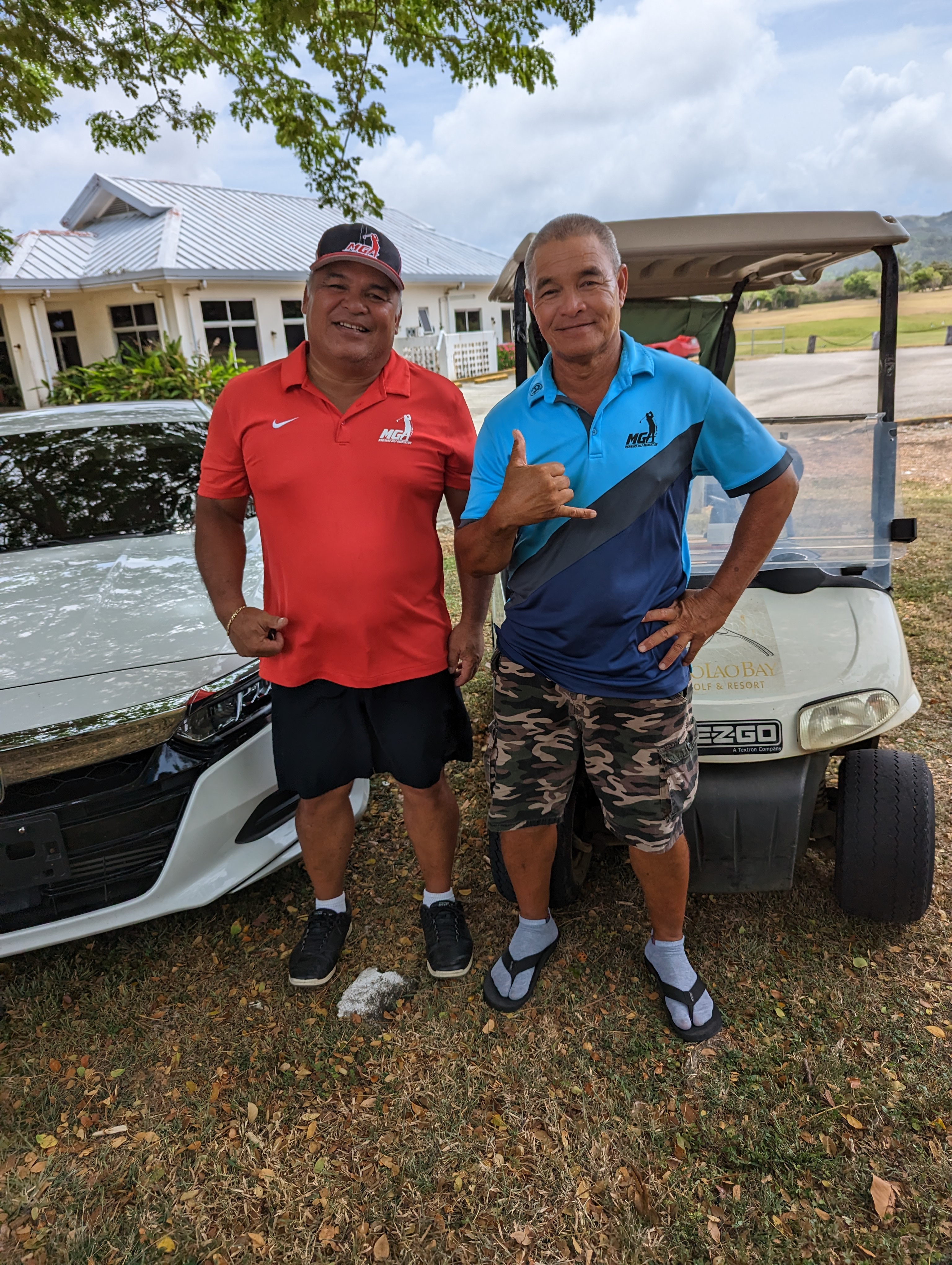 Marianas Golf Association May Ace of the Month Ron Benavente and runner up Joe Camacho pose for a photo after the tournament on Sunday at the Laolao Bay Golf & Resort west course.
