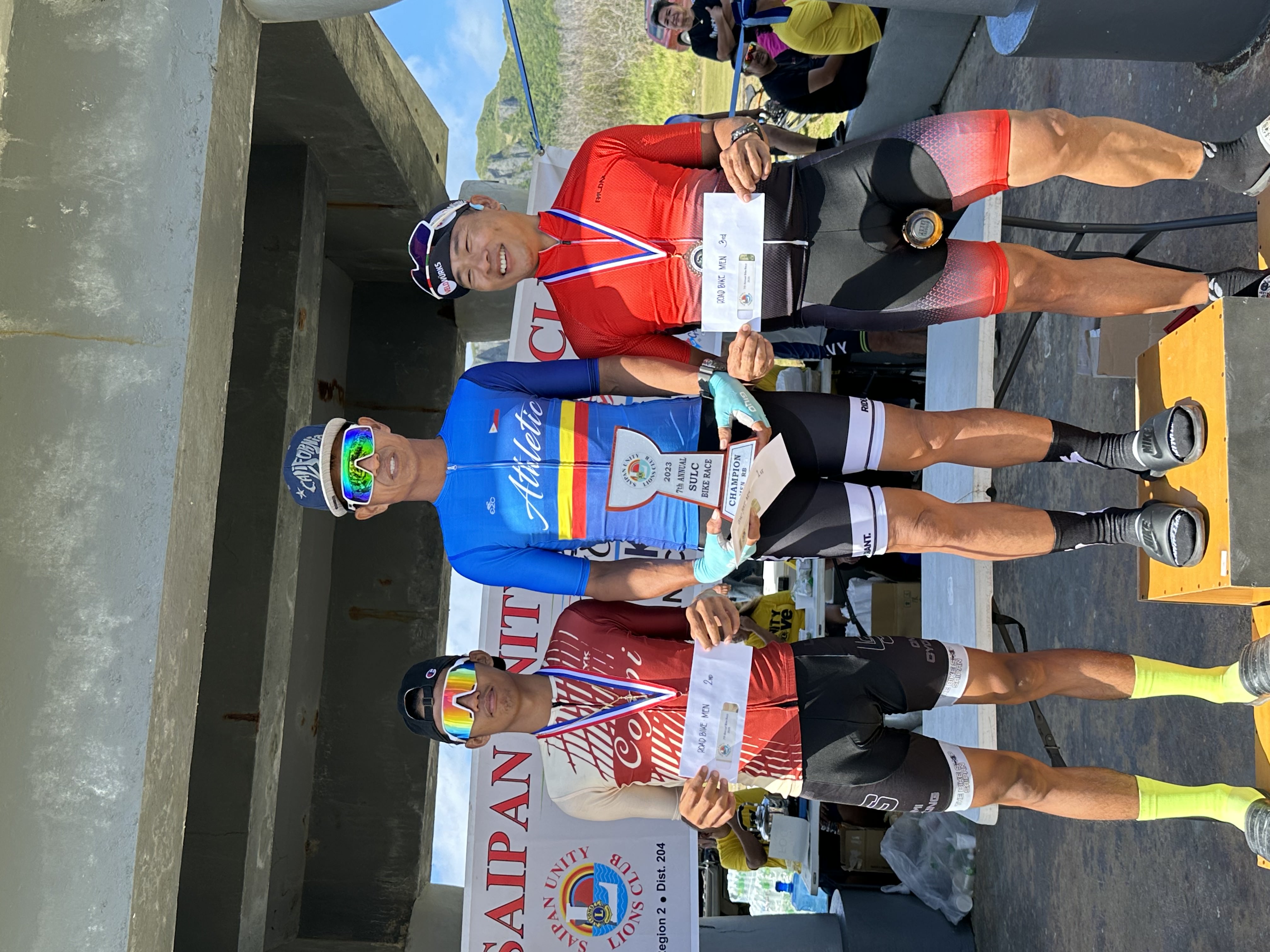 The top three finishers in the road bike, male, long course category: 1st - Joel Buco, 1:16:16; 2nd - RenRen Gaviola, 1:17:03; and 3rd - Nap Dizon, 1:21:40.