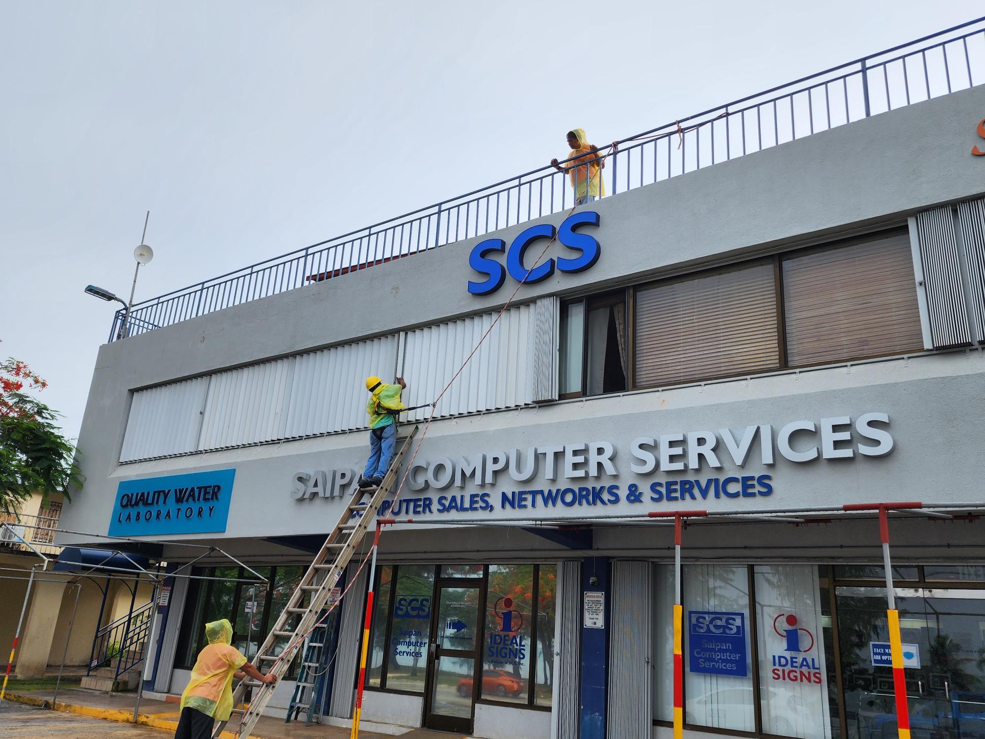 In anticipation of strong typhoon winds, Saipan Computer Services, like other business establishments on island, has installed shutters on its building.