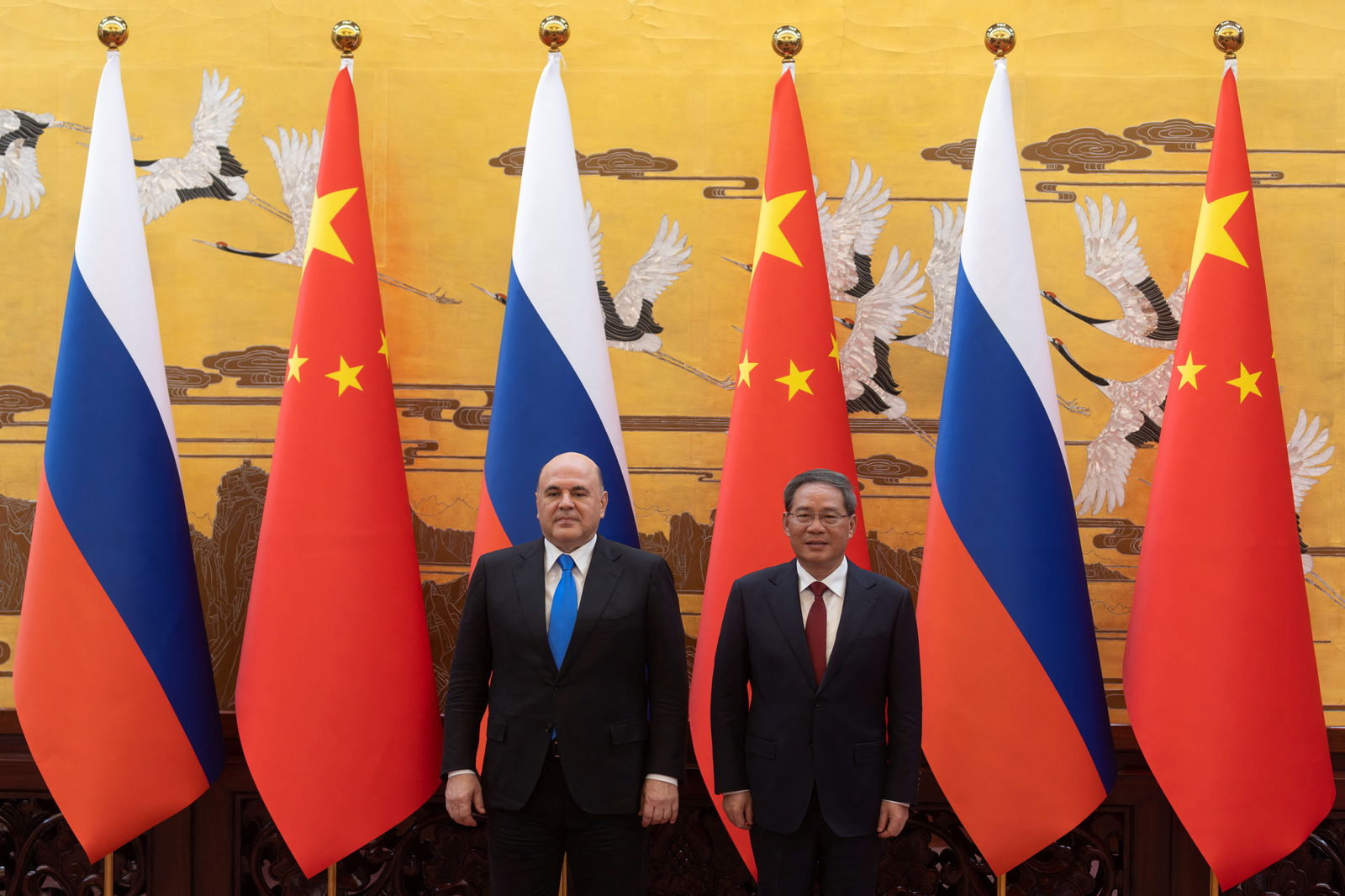 Russian Prime Minister Mikhail Mishustin and Chinese Premier Li Qiang attend a signing ceremony in Beijing, China, May 24, 2023. REUTERS/Thomas Peter/Pool