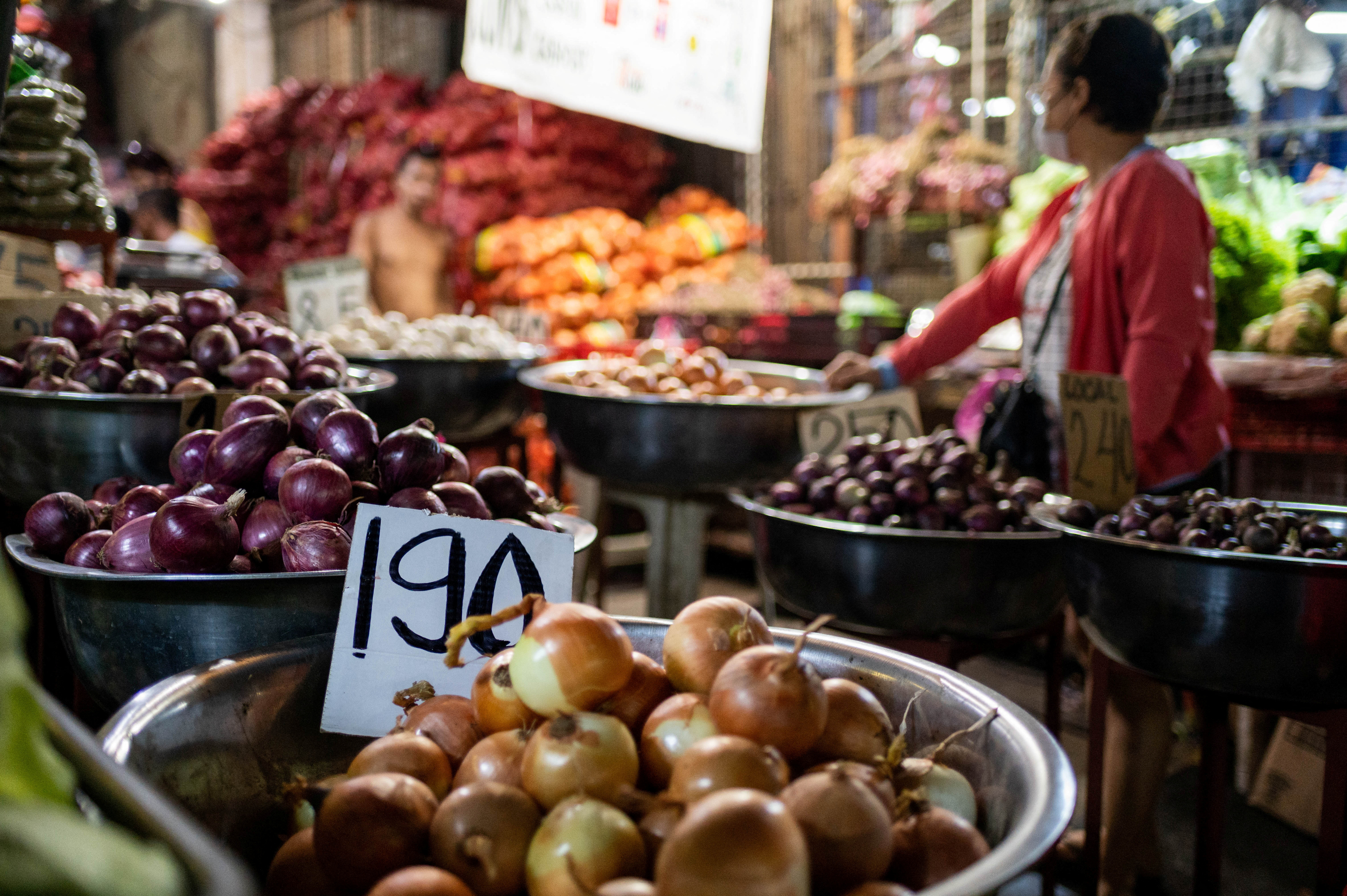FILE PHOTO: Onions are displayed at a stall at a public market in Manila, Philippines, January 28, 2023. REUTERS/Lisa Marie David