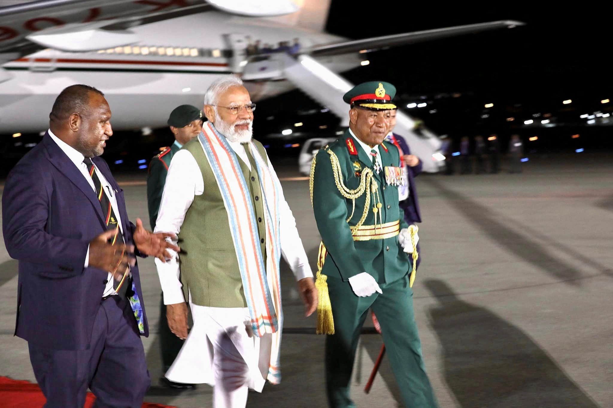 India's Prime Minister Narendra Modi is greeted by Papua New Guinea's Prime Minister James Marape at Jackson International Airport, at Papua New Guinea May 21, 2023. Papua New Guinea government/Handout via REUTERS