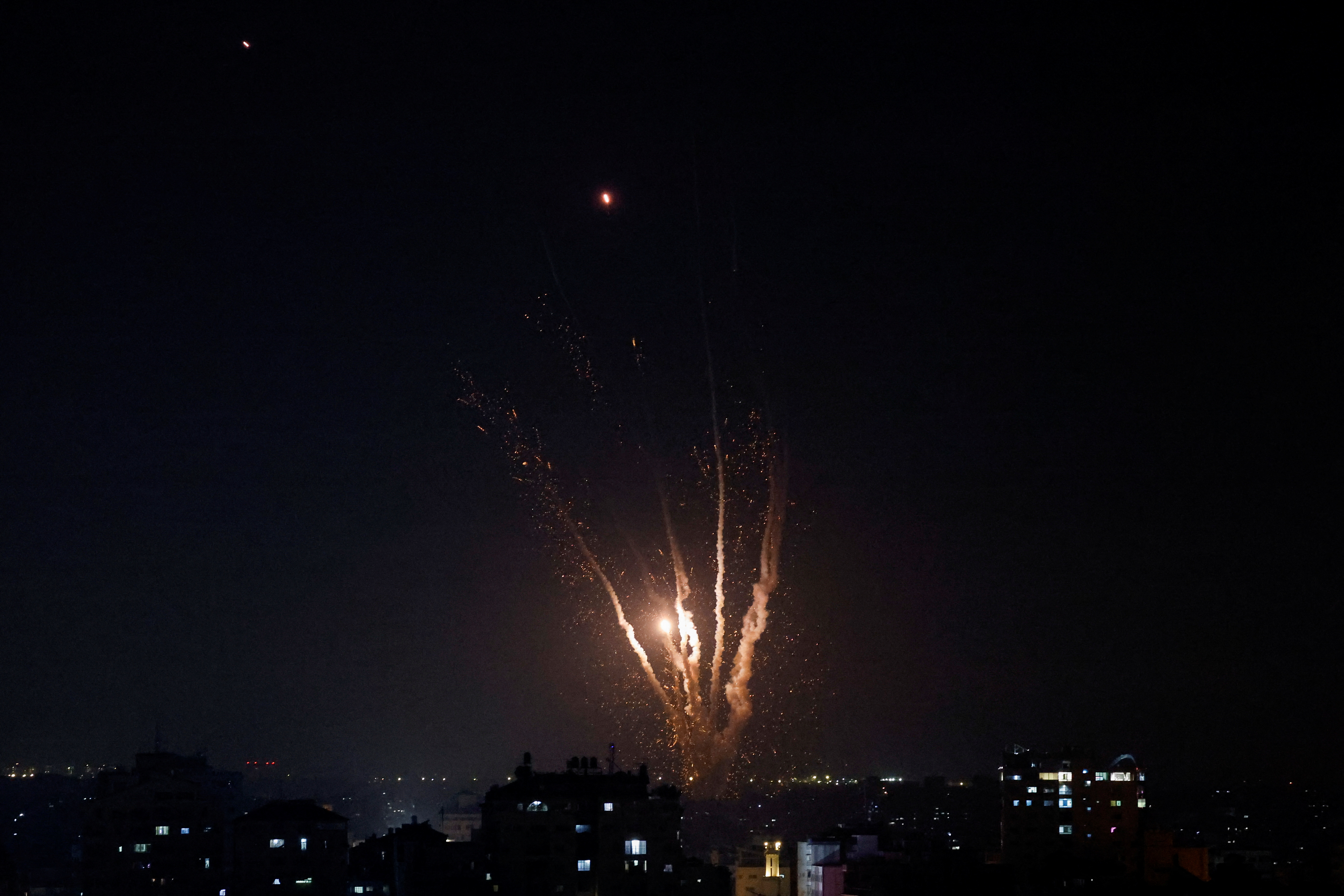 Rockets are fired from Gaza into Israel, in Gaza May 10, 2023. REUTERS/Mohammed Salem