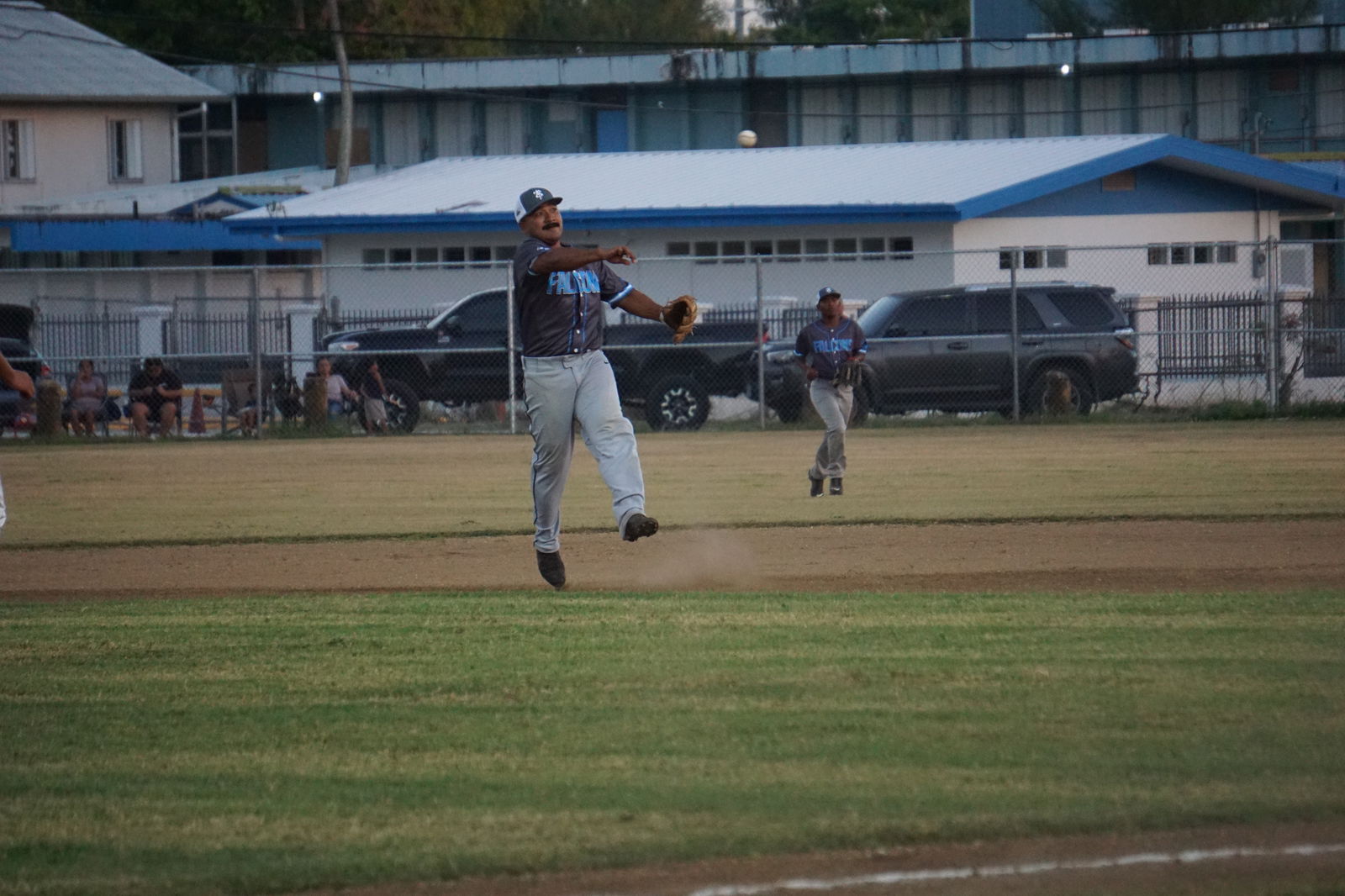 The Falcons’ second baseman Giovanni Mira throws to first base for the out during a Tan Holdings Saipan Baseball League game Tuesday at the Francisco "Tan Ko" Palacios Baseball Field.