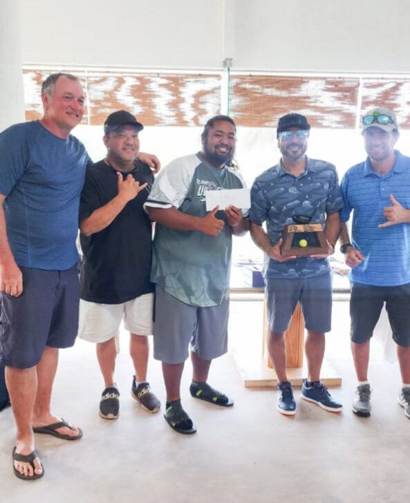 From left, John Favreaux, Ben Rayphand, Felix Rabauliman and Amier Younis, along with Dan Wollak, pose with the perpetual trophy of the 14th Wollak Golf Classic at the Kingfisher Golf Links on Sunday.