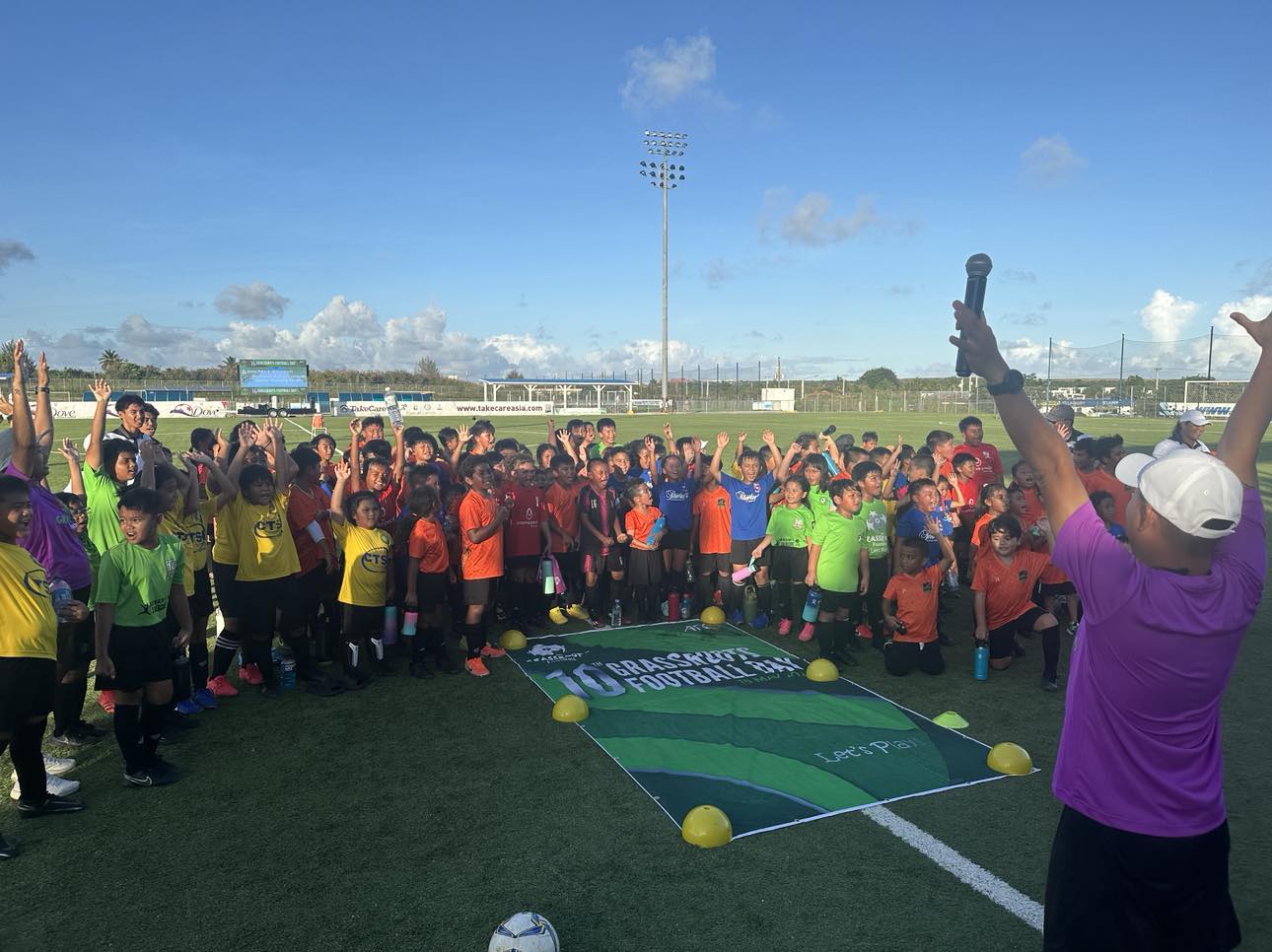 Participants gather during the opening ceremony of the Northern Mariana Islands Football Association's celebration of the 10th Asian Football Confederation Grassroots Football Day at the NMI Soccer Training Center in Koblerville on Saturday.