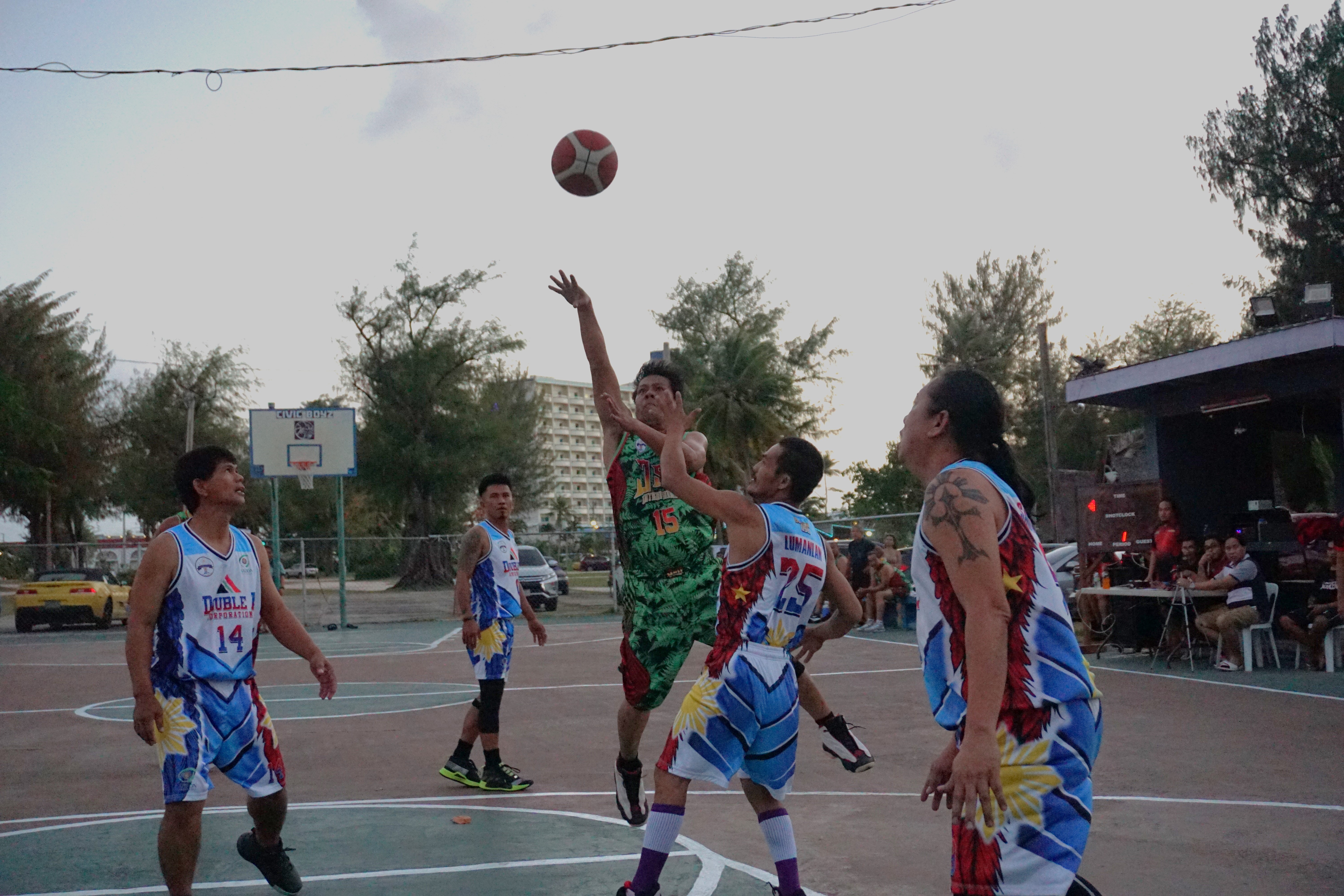 JSN's Joboy Agbanlog takes the off balanced shot during a masters division game of the Saipan Centennial Lions Club Invitational Basketball League on Saturday at the Civic Center basketball court.