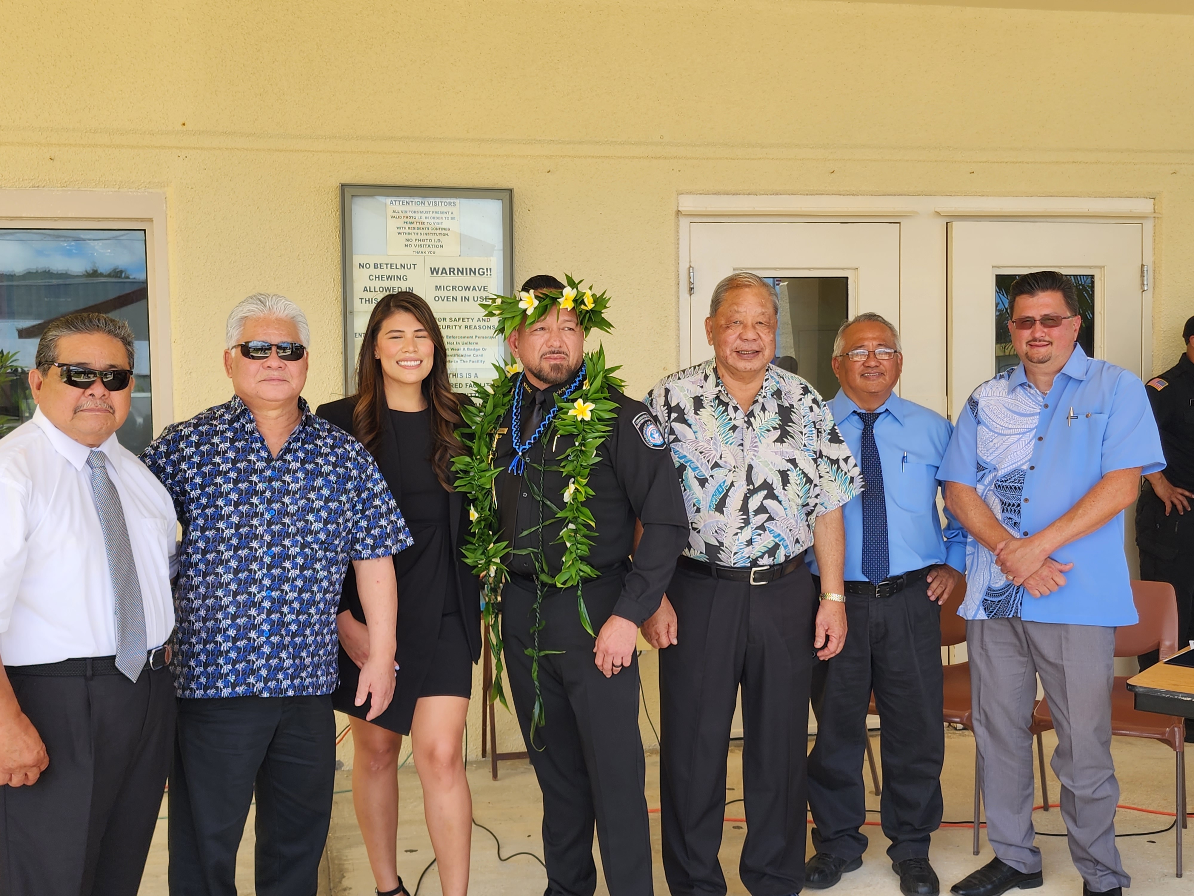 From left, Chief Justice Alexandro Castro, Gov. Arnold Palacios, Adiline Torres, her husband Corrections Commissioner Anthony Torres, Lt. Gov. David Apatang, Presiding Judge Roberto C. Naraja and Rep. Edwin Propst pose for a photo during the CNMI Correctional Officers and Employees Week proclamation signing ceremony on Monday.