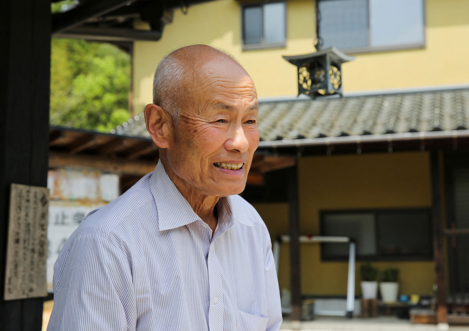 FILE PHOTO: Atomic bomb survivor Toshiyuki Mimaki speaks during an interview with Reuters outside of his home in Yamagata district, Hiroshima prefecture, western Japan May 12, 2023. REUTERS/Sakura Murakami