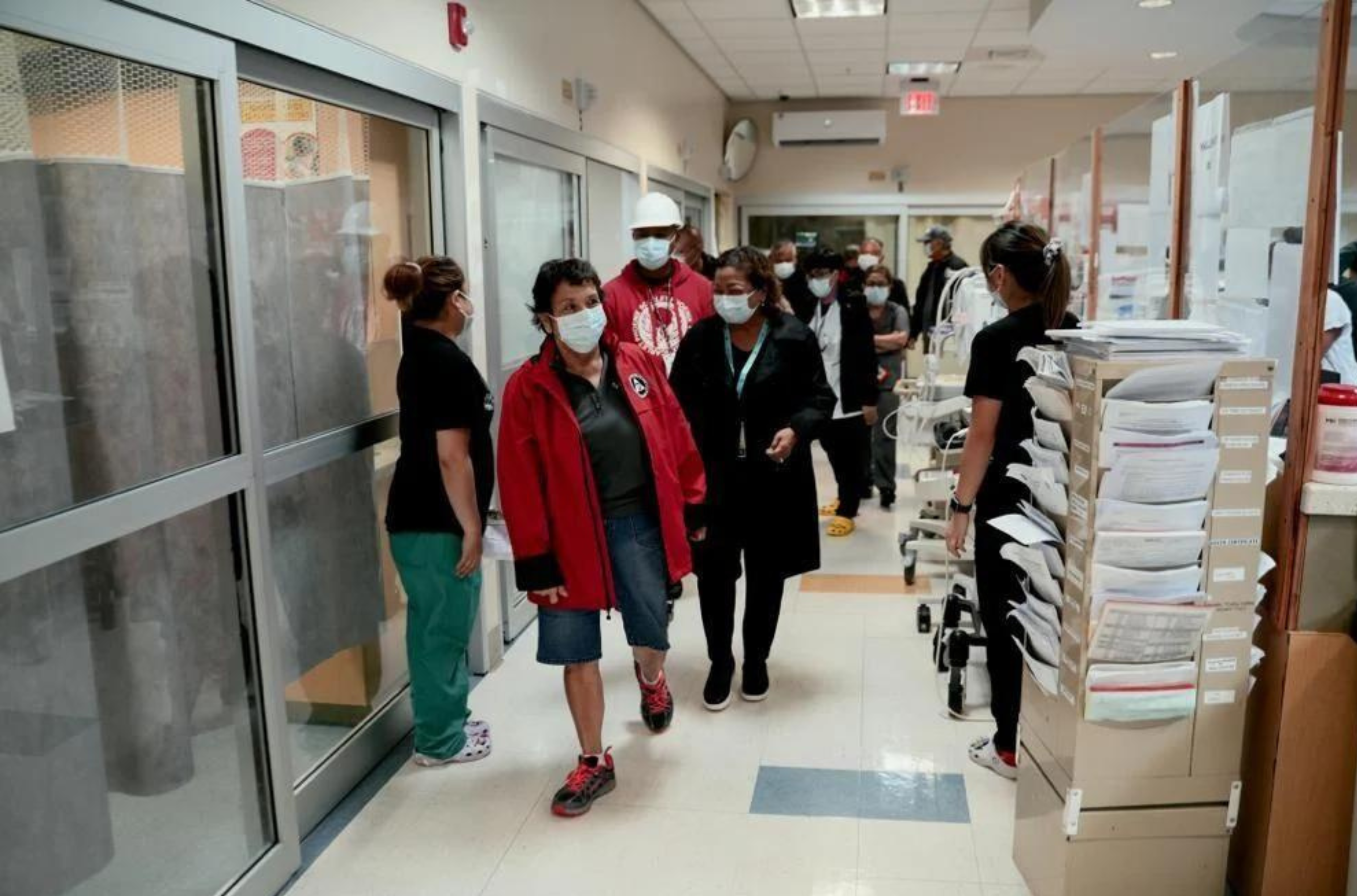 Gov. Lou Leon Guerrero, left, tours the Guam Memorial Hospital Thursday, assessing damage the hospital sustained during Typhoon Mawar. 