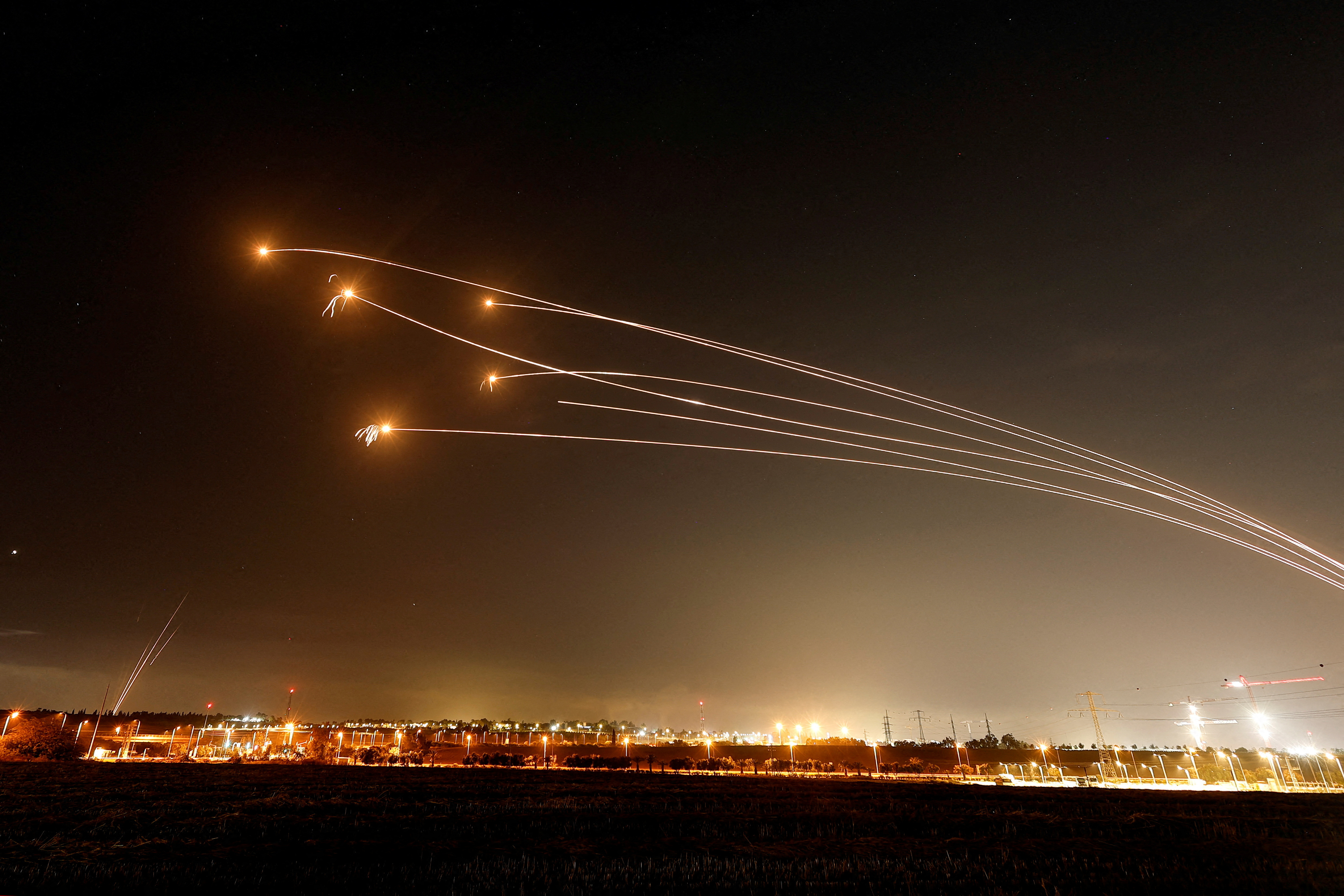 FILE PHOTO: Israel's Iron Dome anti-missile system intercepts rockets launched from the Gaza Strip, as seen from Sderot, Israel May 13, 2023 REUTERS/Ammar Awad/File Photo