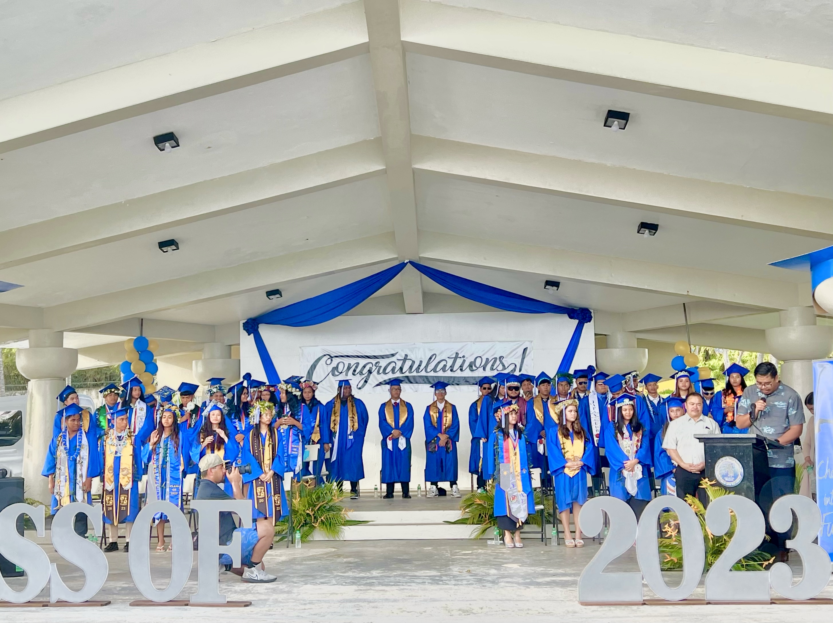 The 41 graduating seniors of Tinian High School’s Class of 2023 with Board of Education Chairman Antonio L. Borja and Commissioner of Education Dr. Alfred B. Ada.