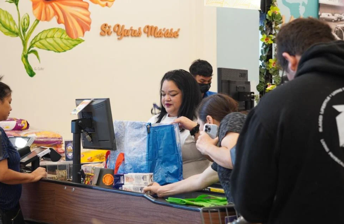 Shoppers stock up on supplies in preparation for Typhoon Mawar at Maite Pay-Less on Monday, May 22, 2023.