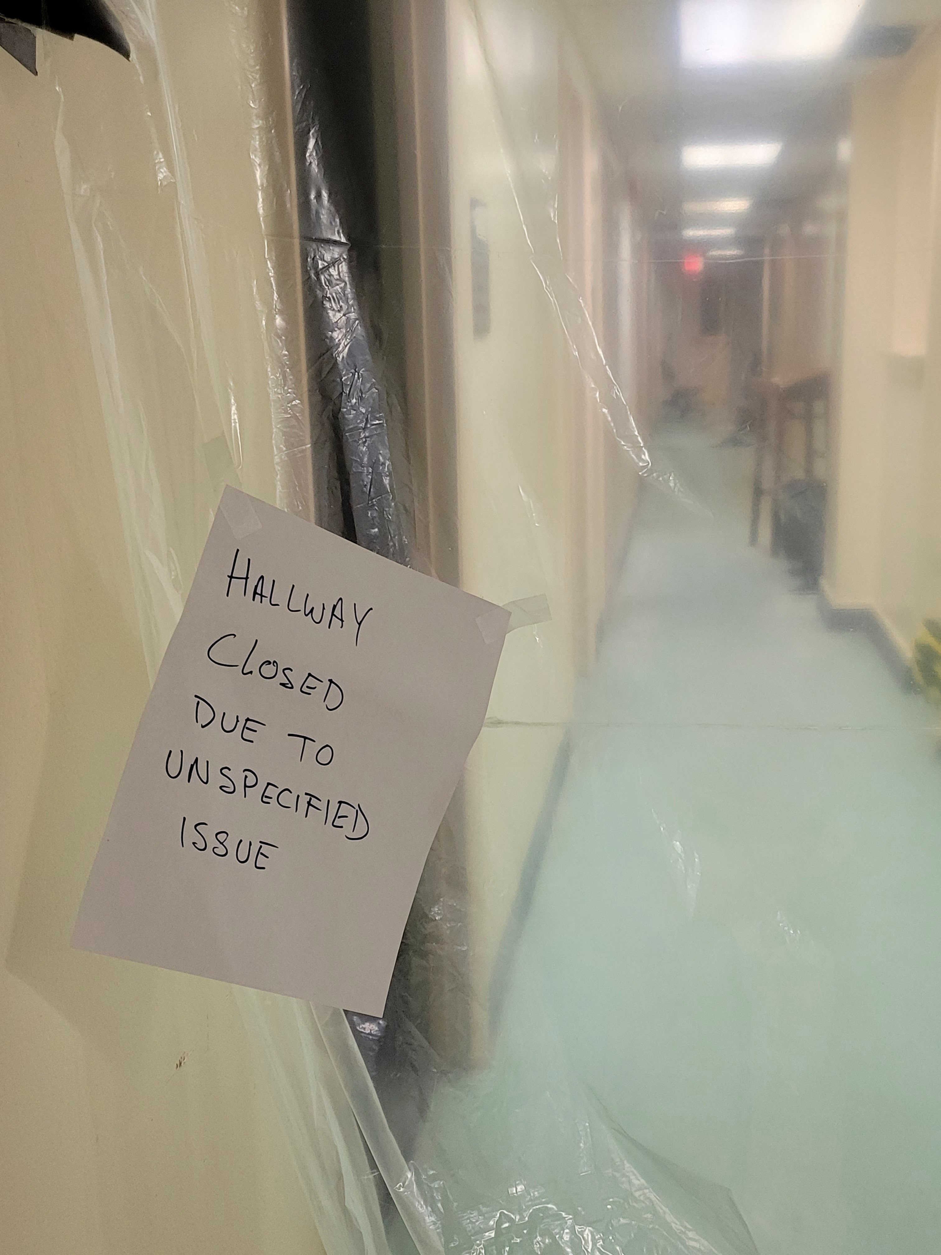 A damaged hallway in the U.S. Department of Agriculture’s (USDA) Beltsville Agricultural Research Center (BARC) is seen in a photo taken by an employee three weeks after a 2022 Christmas Day flood and ceiling collapses at the research facility, where employees have now filed whistleblower complaints over working conditions, in Beltsville, Maryland, U.S. January 20, 2023. Ashaki "Teddi" Mitchell/Handout via Reuters
