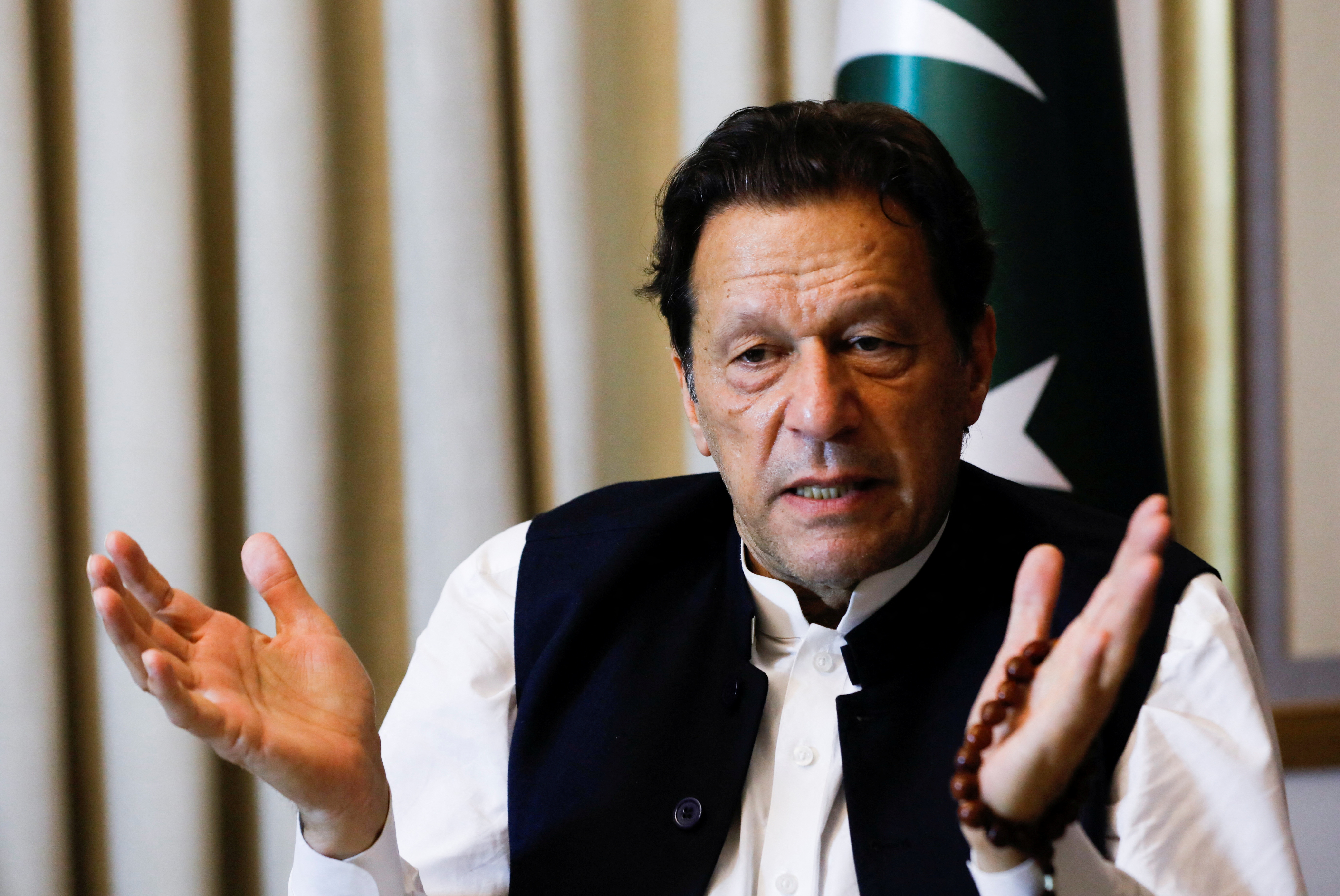 FILE PHOTO: Former Pakistani Prime Minister Imran Khan, gestures as he speaks with Reuters during an interview, in Lahore, Pakistan March 17, 2023. REUTERS/Akhtar Soomro