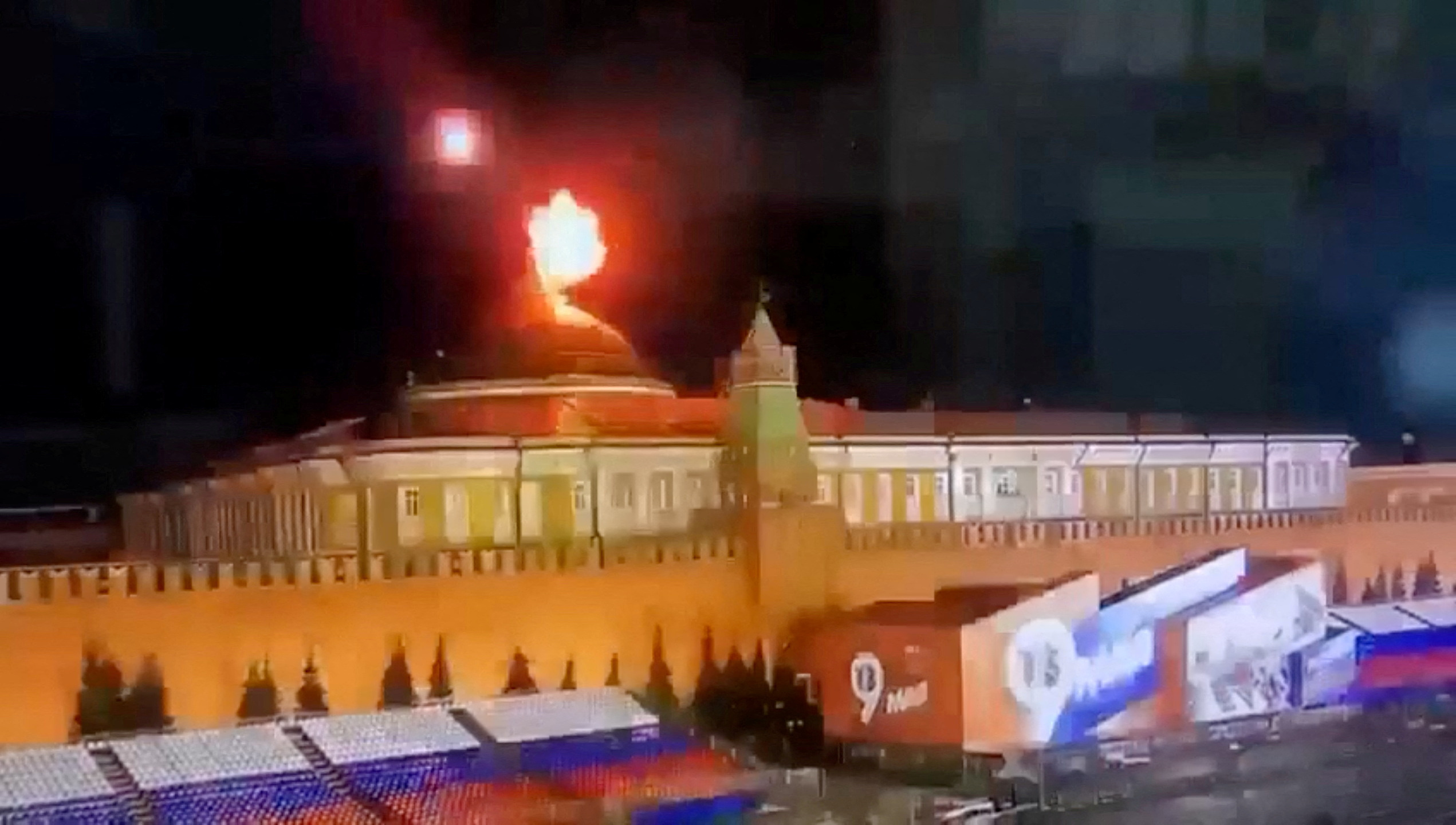 FILE PHOTO: A still image taken from video shows a flying object exploding in an intense burst of light near the dome of the Kremlin Senate building during the alleged Ukrainian drone attack in Moscow, Russia, in this image taken from video obtained by Reuters May 3, 2023. Ostorozhno Novosti/Handout via REUTERS