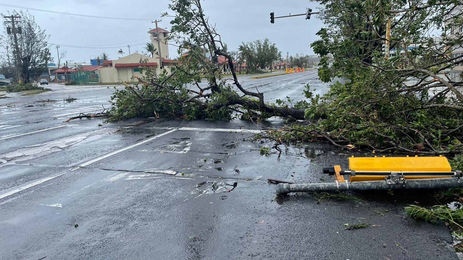 Downed streetlights and trees block two northbound lanes of Marine Corps Drive in Hagåtña after Typhoon Mawar, on Thursday, May 26, 2023. 