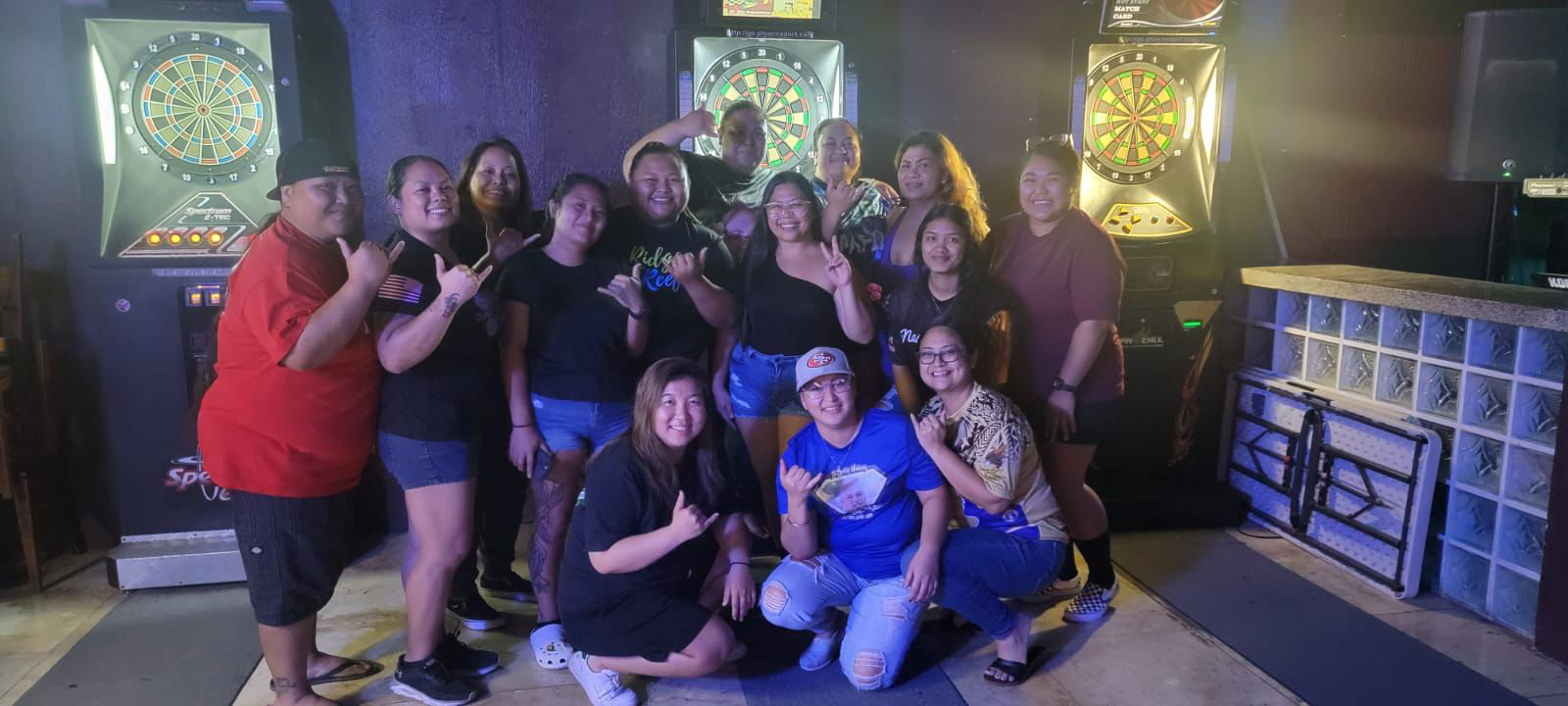Jonny's Darty Queens and the Bistro Rookies pose for a phot after their game in the ladies division of the 2023 SEDA Bud Light Dart League at Jonny's Bar on Monday.