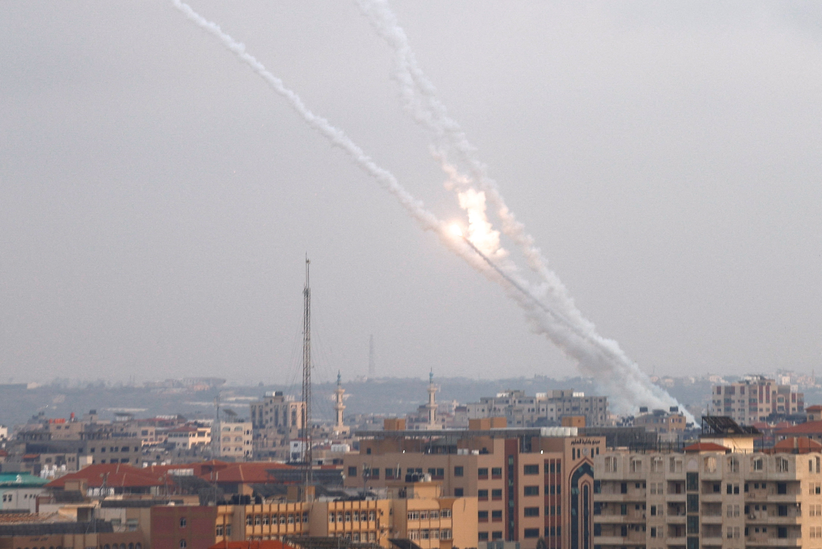 FILE PHOTO: Rockets are fired from Gaza into Israel, in Gaza May 12, 2023. REUTERS/Mohammed Salem/File Photo