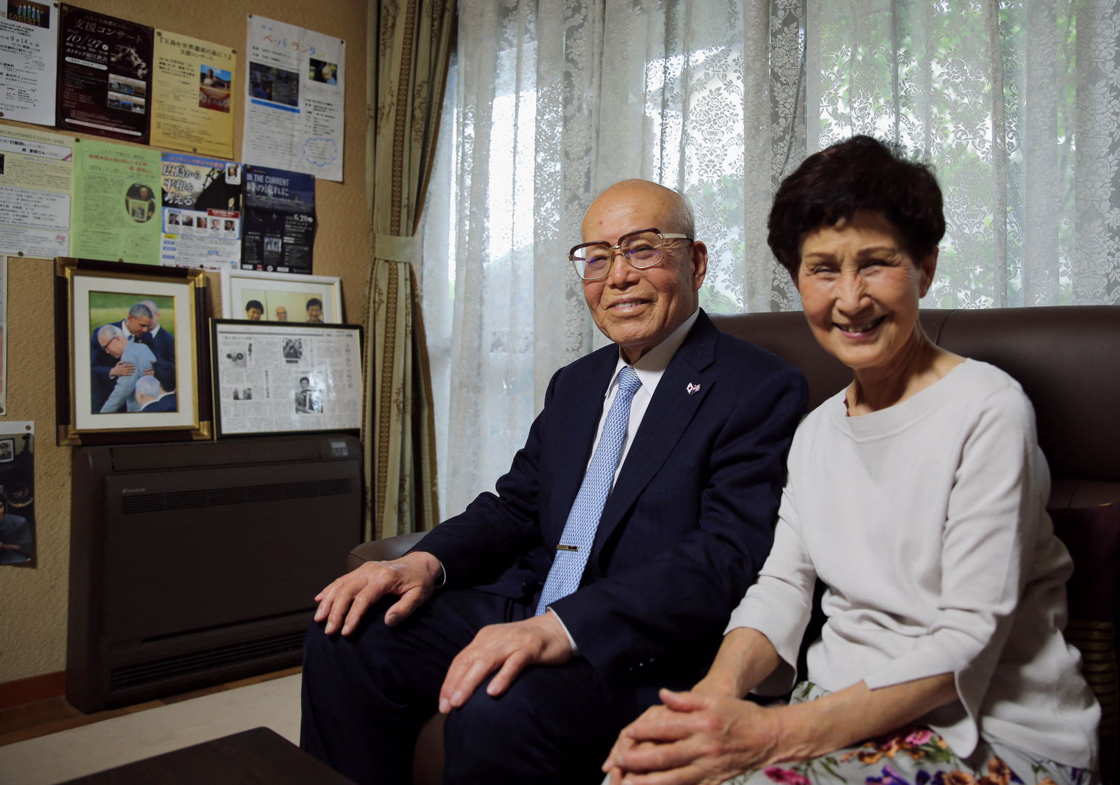 FILE PHOTO: Atomic bomb survivor Shigeaki Mori and his wife Kayoko pose for a photograph during an interview with Reuters at their home in Hiroshima, western Japan May 11, 2023. REUTERS/Sakura Murakami