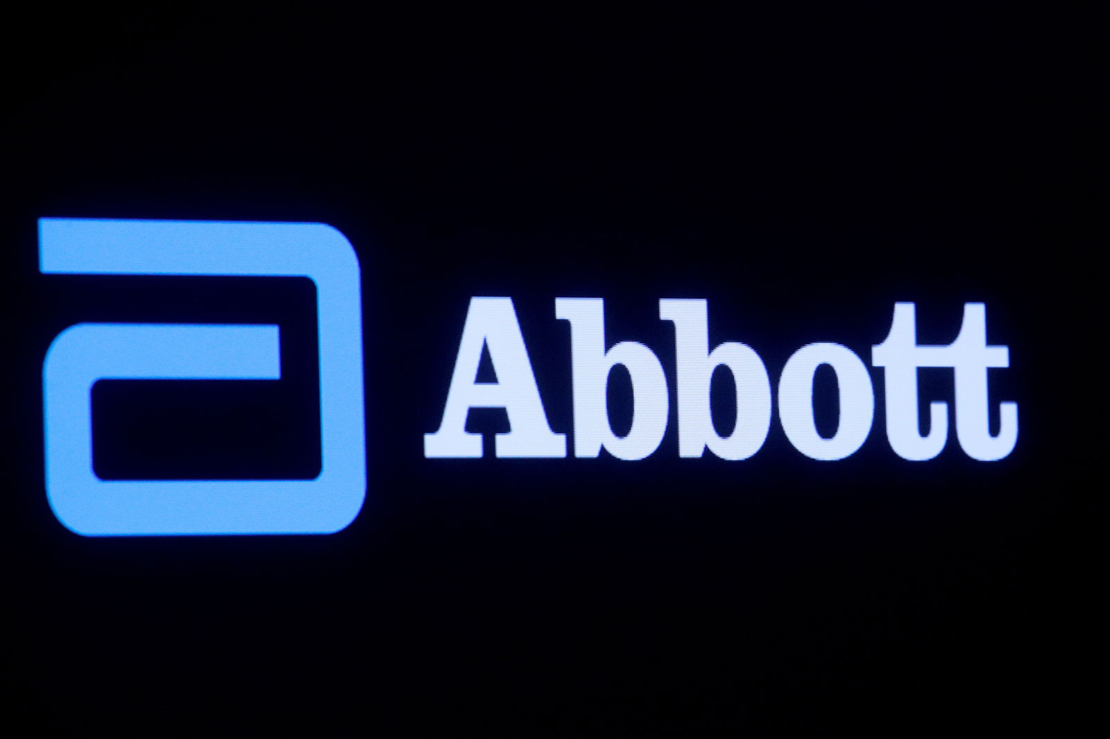FILE PHOTO: Abbott Laboratories logo is displayed on a screen at the New York Stock Exchange (NYSE) in New York City, U.S., October 18, 2021. REUTERS/Brendan McDermid