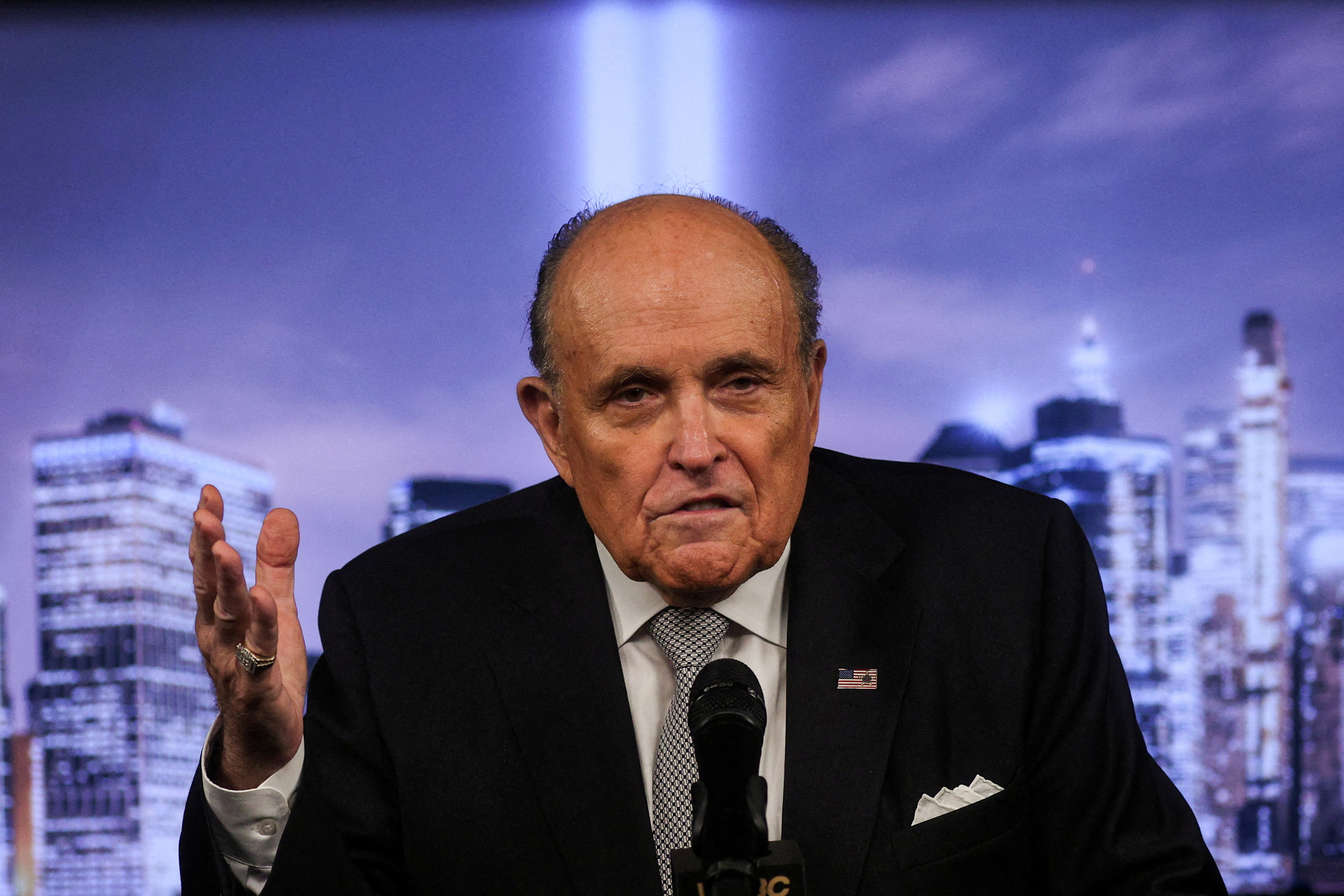 FILE PHOTO: Former New York City Mayor Rudy Giuliani delivers remarks on the September 11 attacks during a news conference in New York, U.S., September 9, 2022. REUTERS/Amr Alfiky