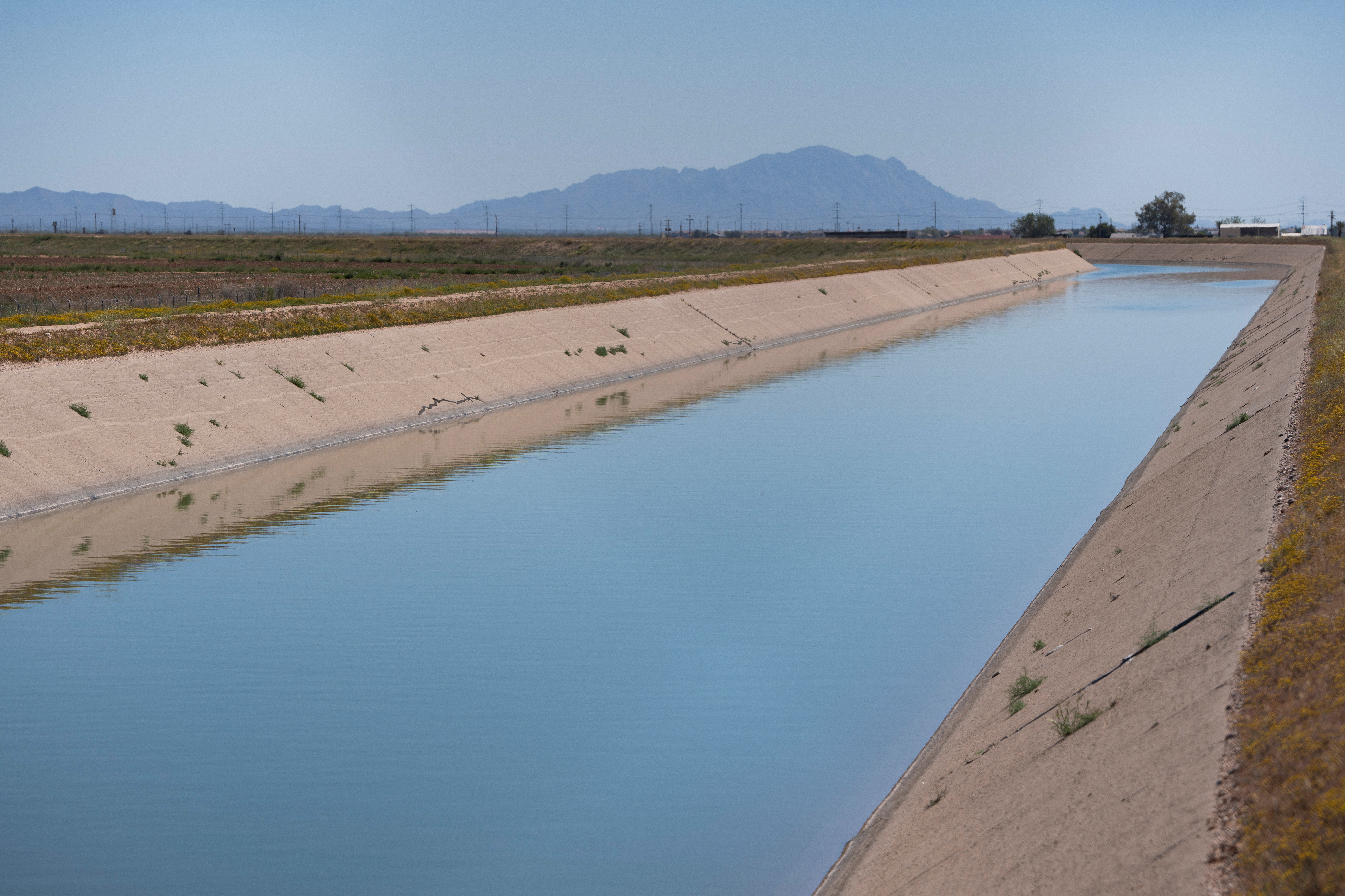 Colorado River water runs through Central Arizona Project canals in Pinal County, Arizona, U.S., April 9, 2023. REUTERS/Rebecca Noble/File Photo