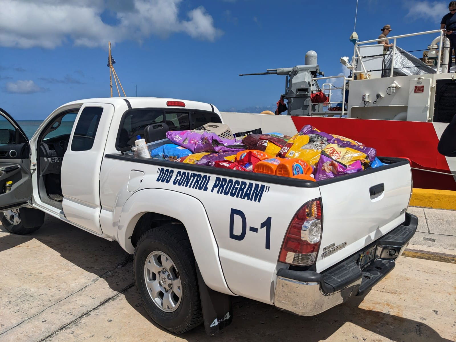 Bags of pet food and other items were donated by the U.S. Coast Guard.