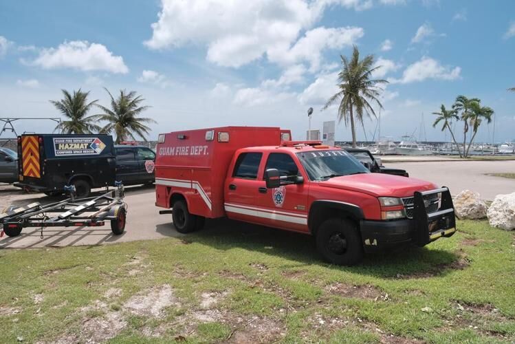 A Guam Fire Department rescue vehicle parked near the GFD rescue base during the search for a missing swimmer at the Hågat Marina on Friday, May 26, 2023. 