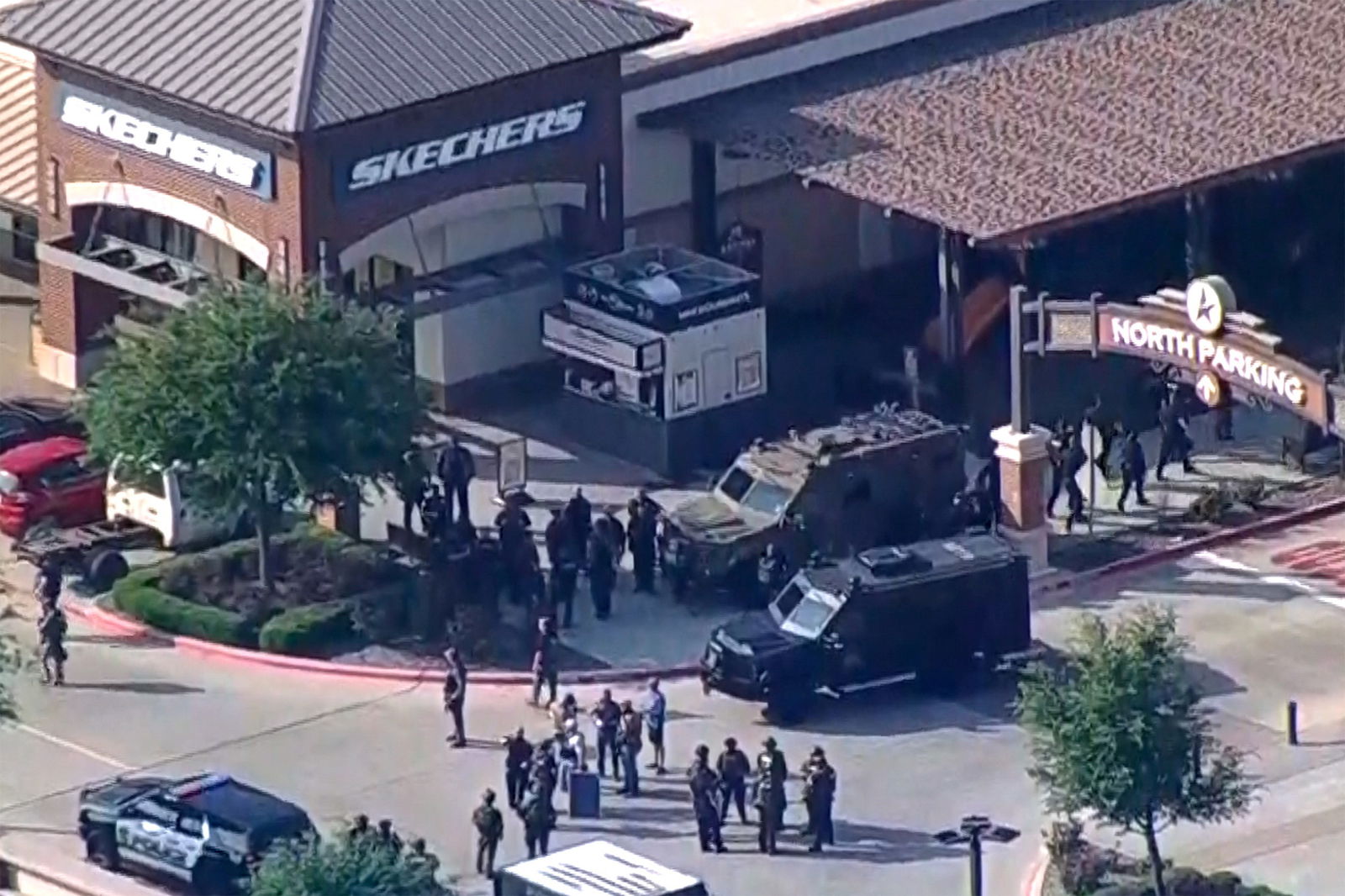 Police respond to a shooting in the Dallas area's Allen Premium Outlets, which authorities said has left multiple people injured in Allen, Texas, U.S. May 6, 2023 in a still image from video. ABC Affiliate WFAA via REUTERS
