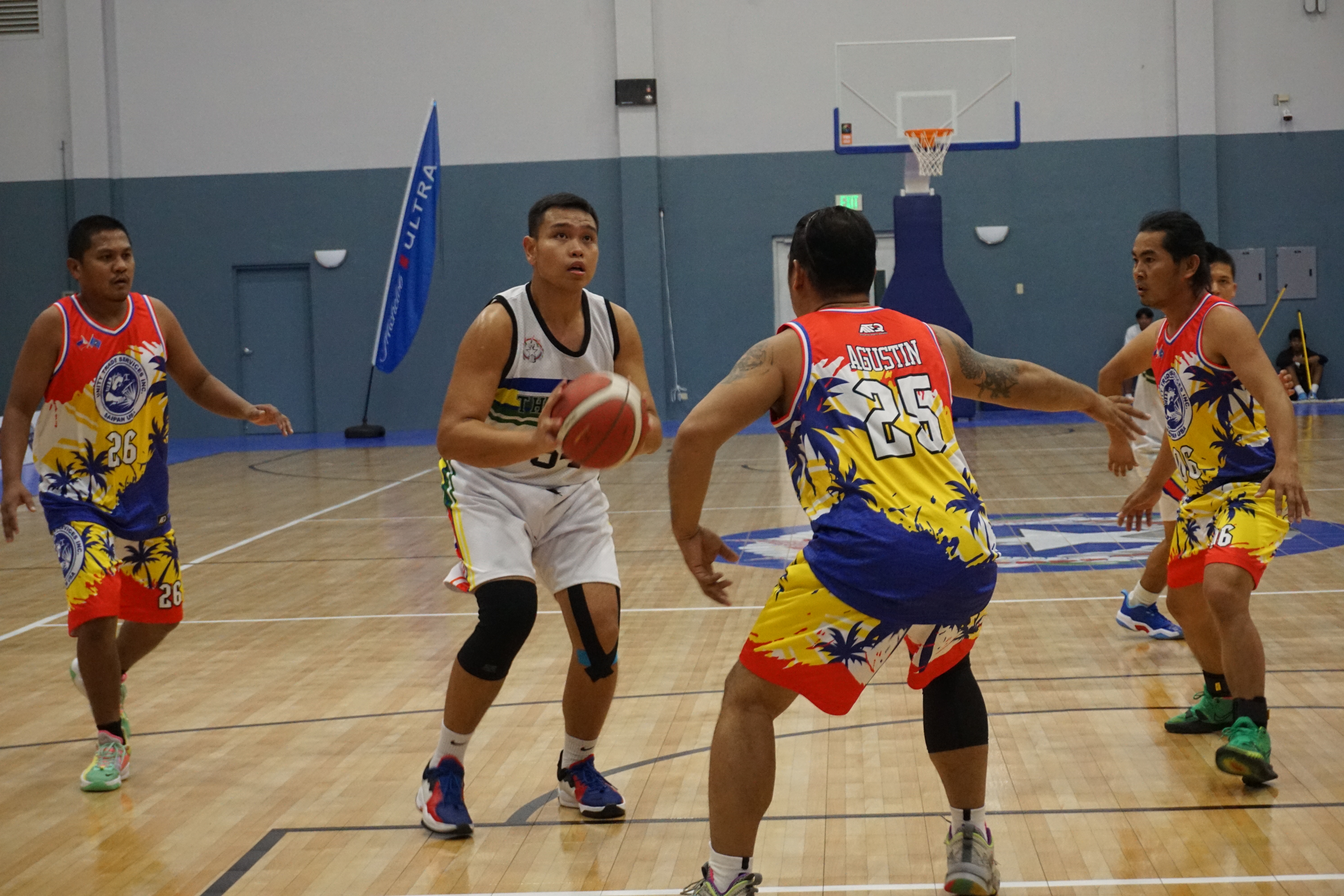 La Mesa Kusina's Arfin Chua gathers for a midrange jumper during a Michelob Ultra Cup game Saturday at the Ada gym.