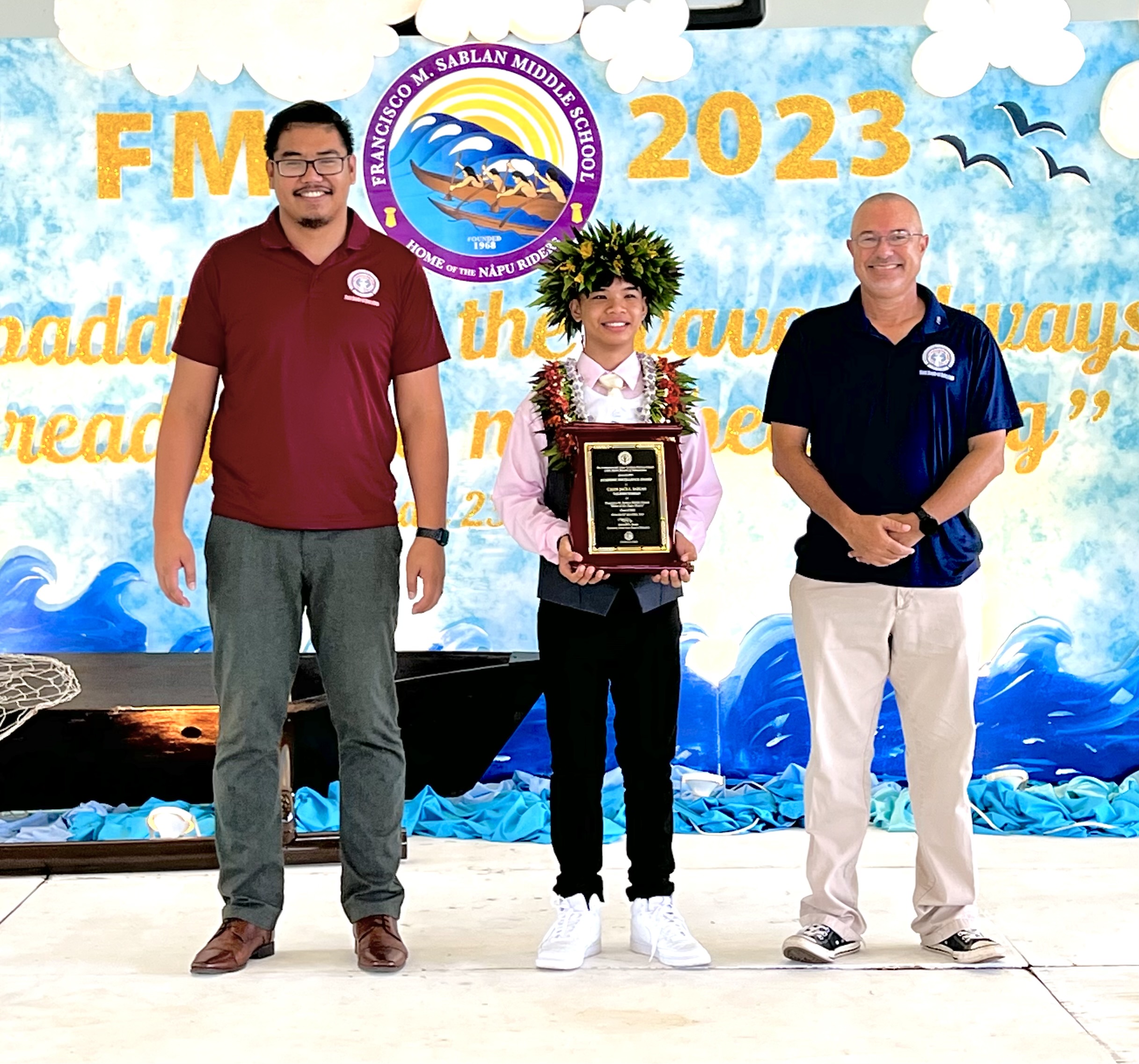 Caleb Jack L. Sablan, center, is this year’s class valedictorian. He received the Board of Education Academic Excellence Award from BOE Chairman Antonio L. Borja, left, and BOE Secretary/Treasurer Gregory Pat Borja.