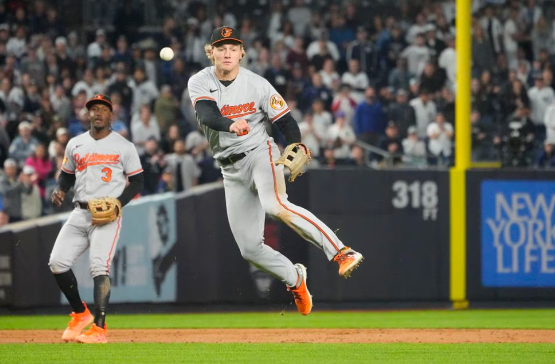 Baltimore Orioles third baseman Gunnar Henderson (2) throws out New York Yankees center fielder Harrison Bader (not pictured) after fielding a ground ball during the tenth inning at Yankee Stadium in Bronx, New York,  May 23, 2023.