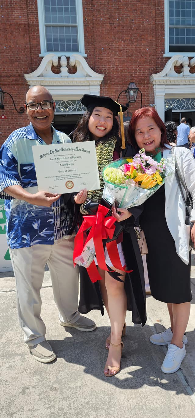 Dr. Minori Yoshida and parents Steven and Jane Metayer.