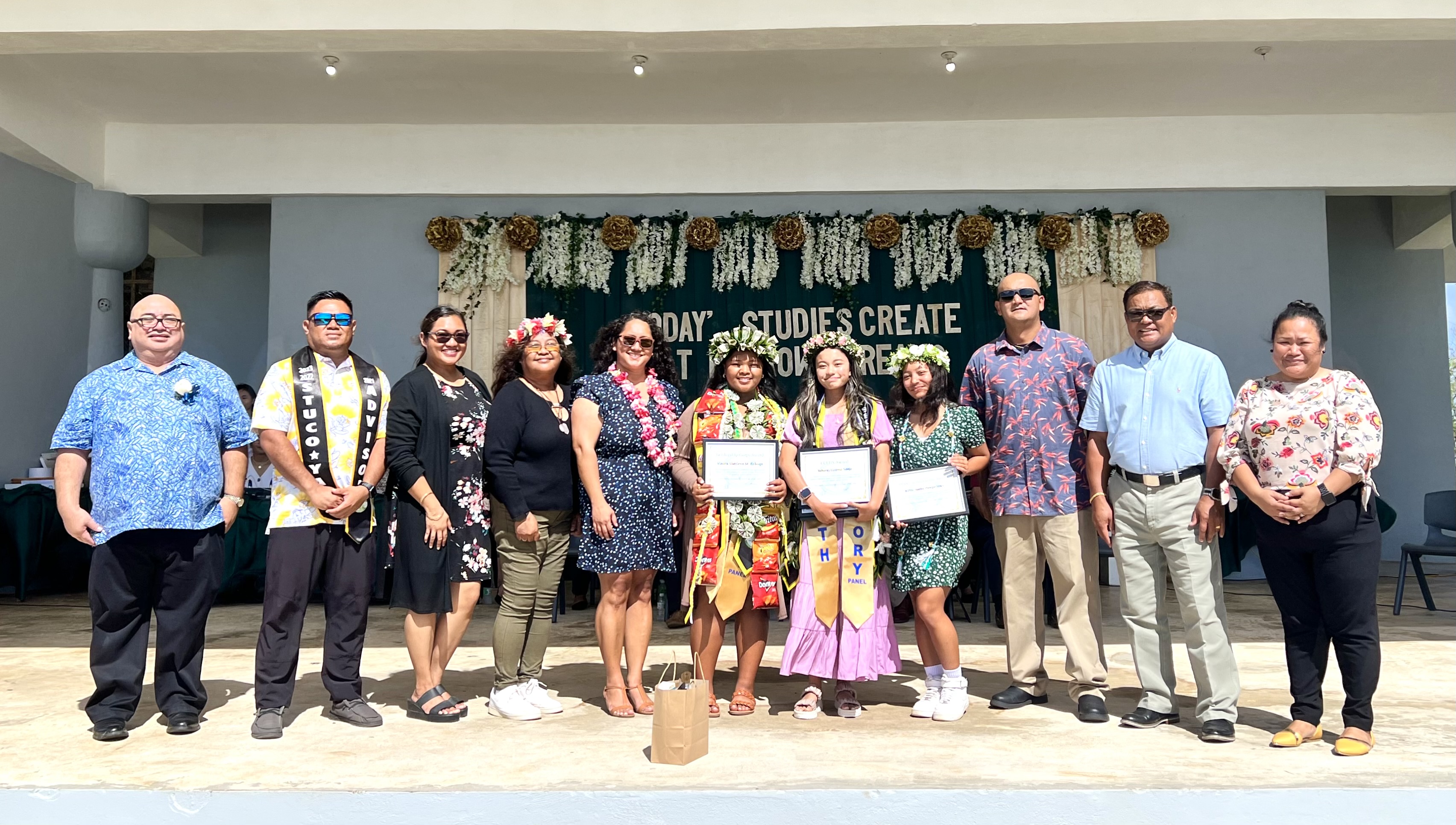 Dandan Middle School subject award recipients Ysharei Sanje (English Language Arts, Mathematics, Science, Social Studies, Chamorro Carolinian Language and Heritage Studies, and Career and Technology), Billie Pangelinan (Physical Education) and Vinora Rabago (Leadership Corps) with their teachers.