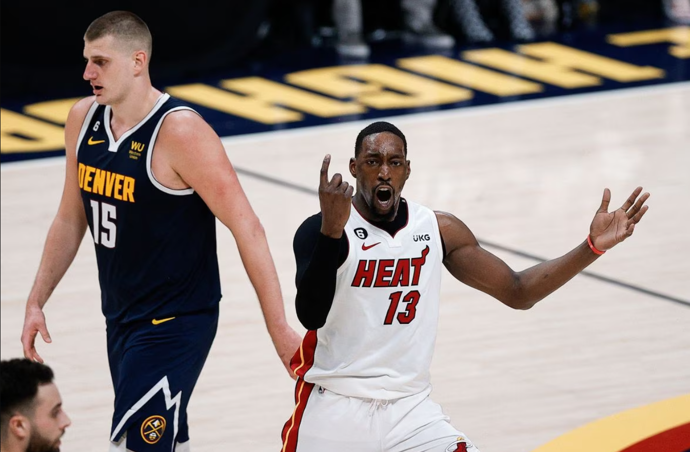 Miami Heat center Bam Adebayo reacts after a play with Denver Nuggets center Nikola Jokic in the third quarter in game two of the 2023 NBA Finals at Ball Arena in Denver on June 4, 2023.