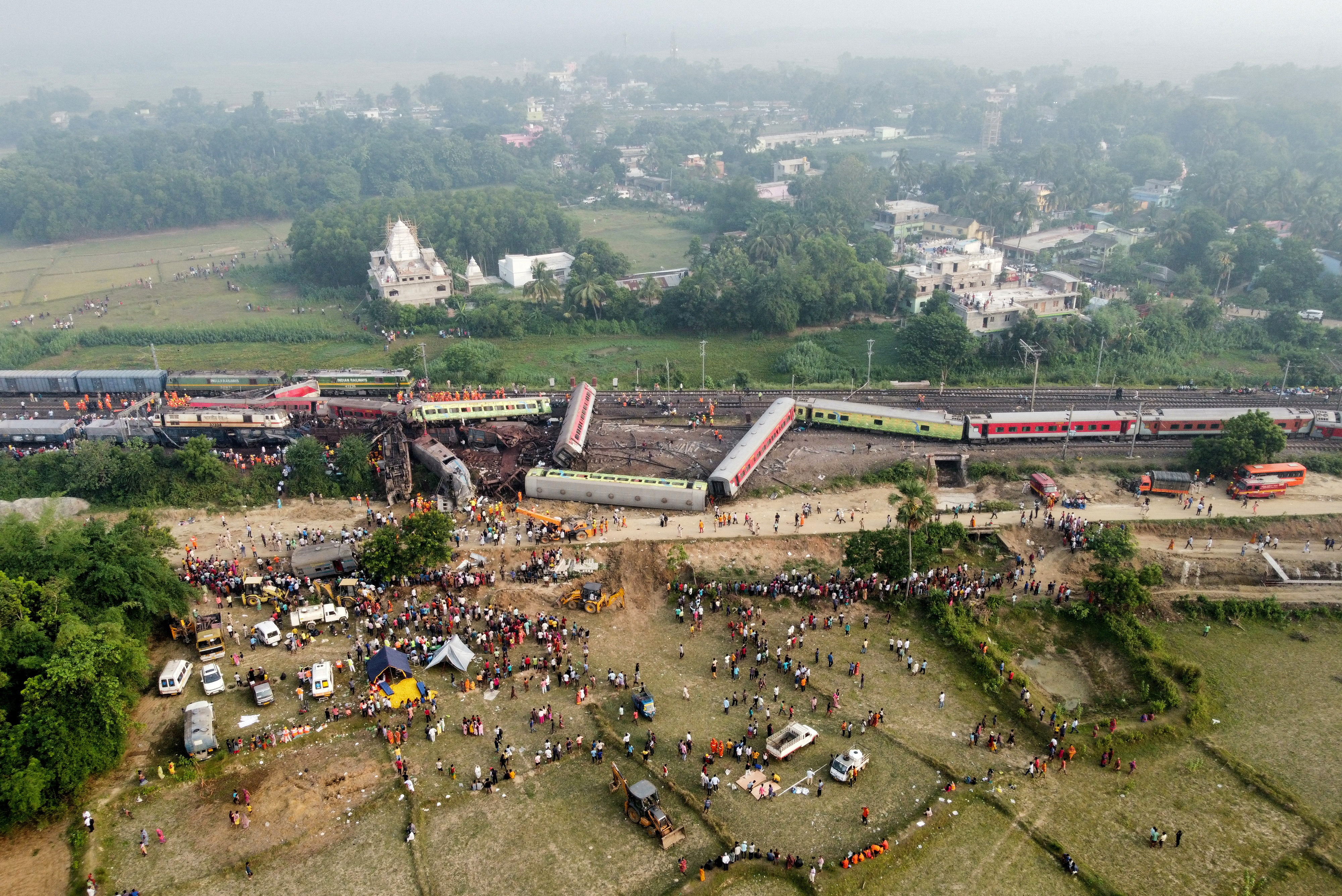 A drone view shows derailed coaches after two passenger trains collided in Balasore district in the eastern state of Odisha, India, June 3, 2023. REUTERS/Stringer