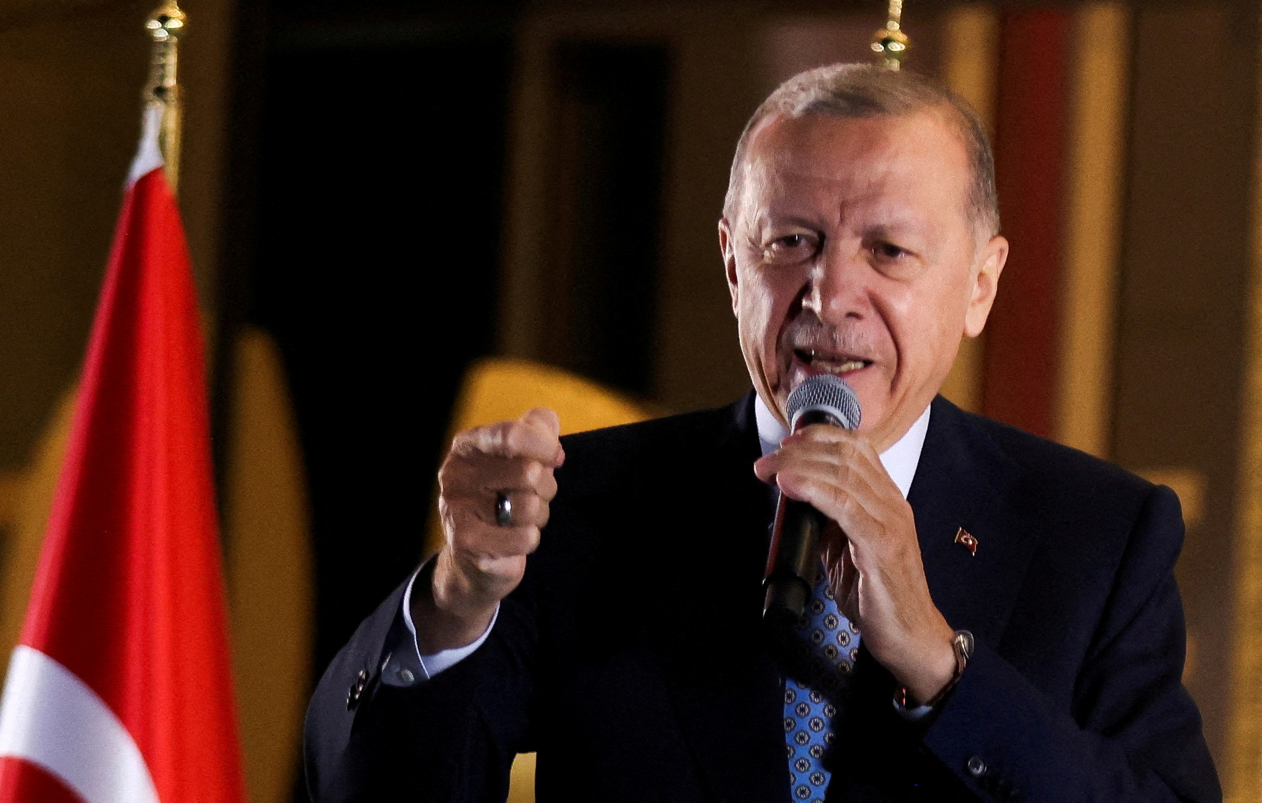 FILE PHOTO: Turkish President Tayyip Erdogan addresses his supporters following his victory in the second round of the presidential election at the Presidential Palace in Ankara, Turkey May 29, 2023. REUTERS/Umit Bektas/File Photo
