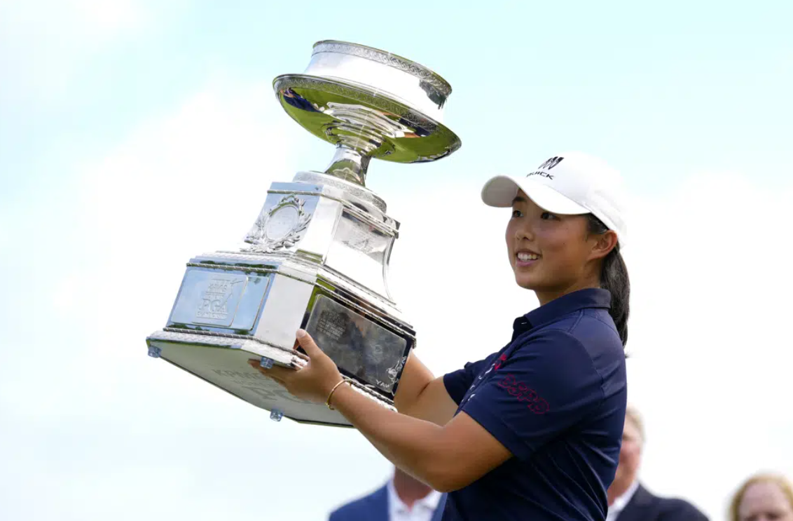 Ruoning Yin, of China, holds the trophy after winning the Women's PGA Championship golf tournament, Sunday, June 25, 2023, in Springfield, N.J.
