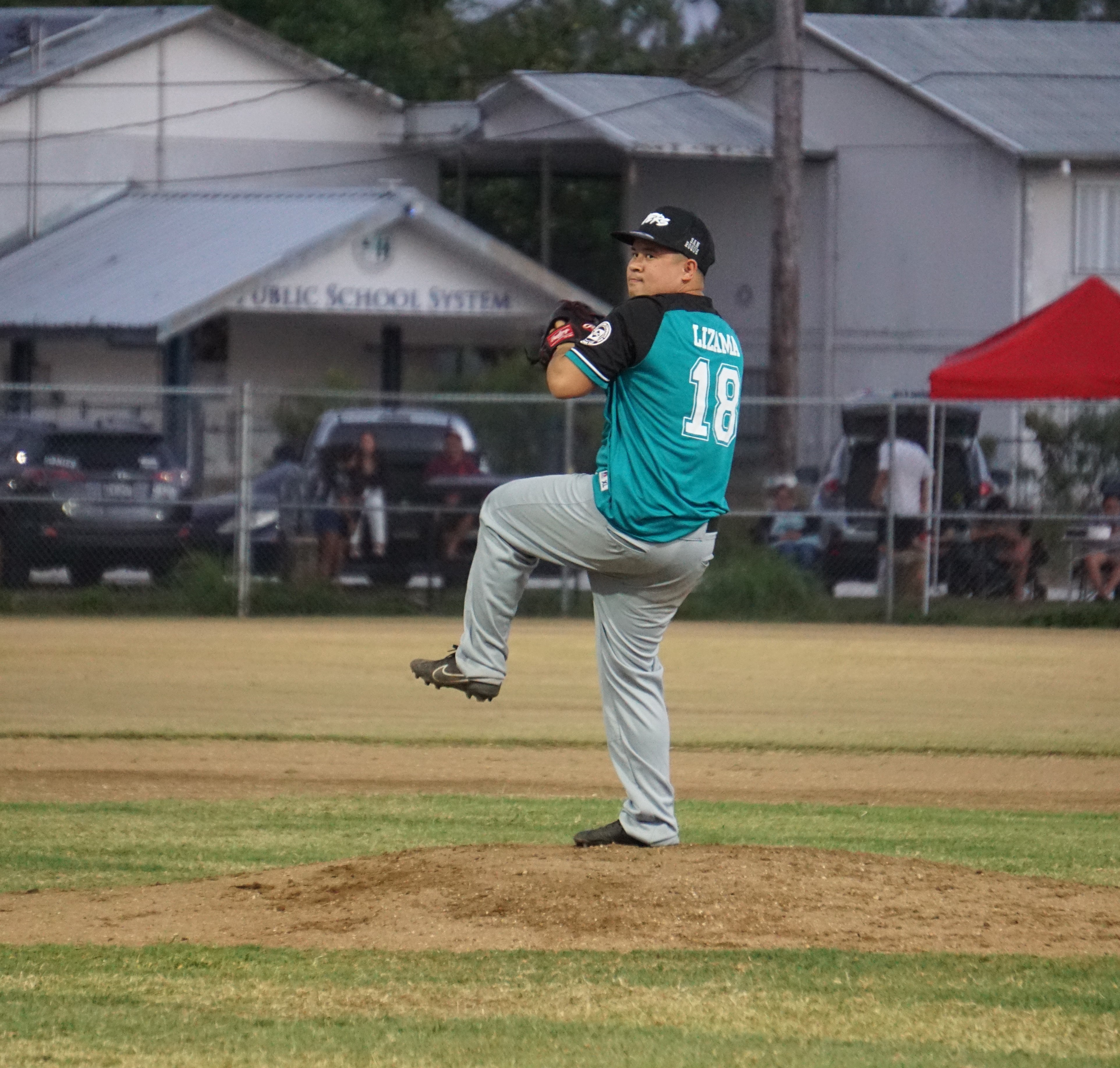 D9er's Ben Lizama pitches against the Falcons during a 2023 Tan Holdings Saipan Baseball League game at the Francisco "Tan Ko" Palacios Baseball Field.
